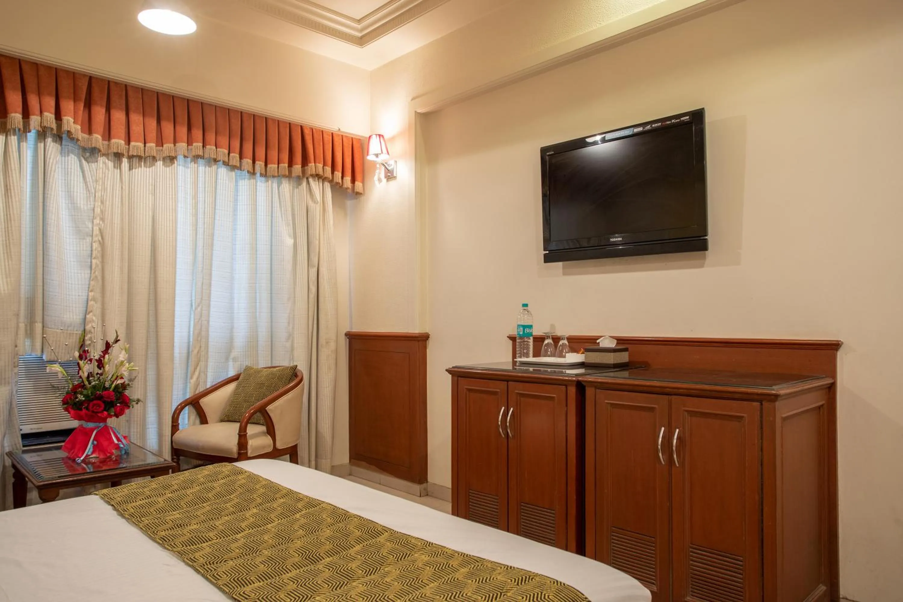 Photo of the whole room, Bed in Hotel Dwaraka Residency