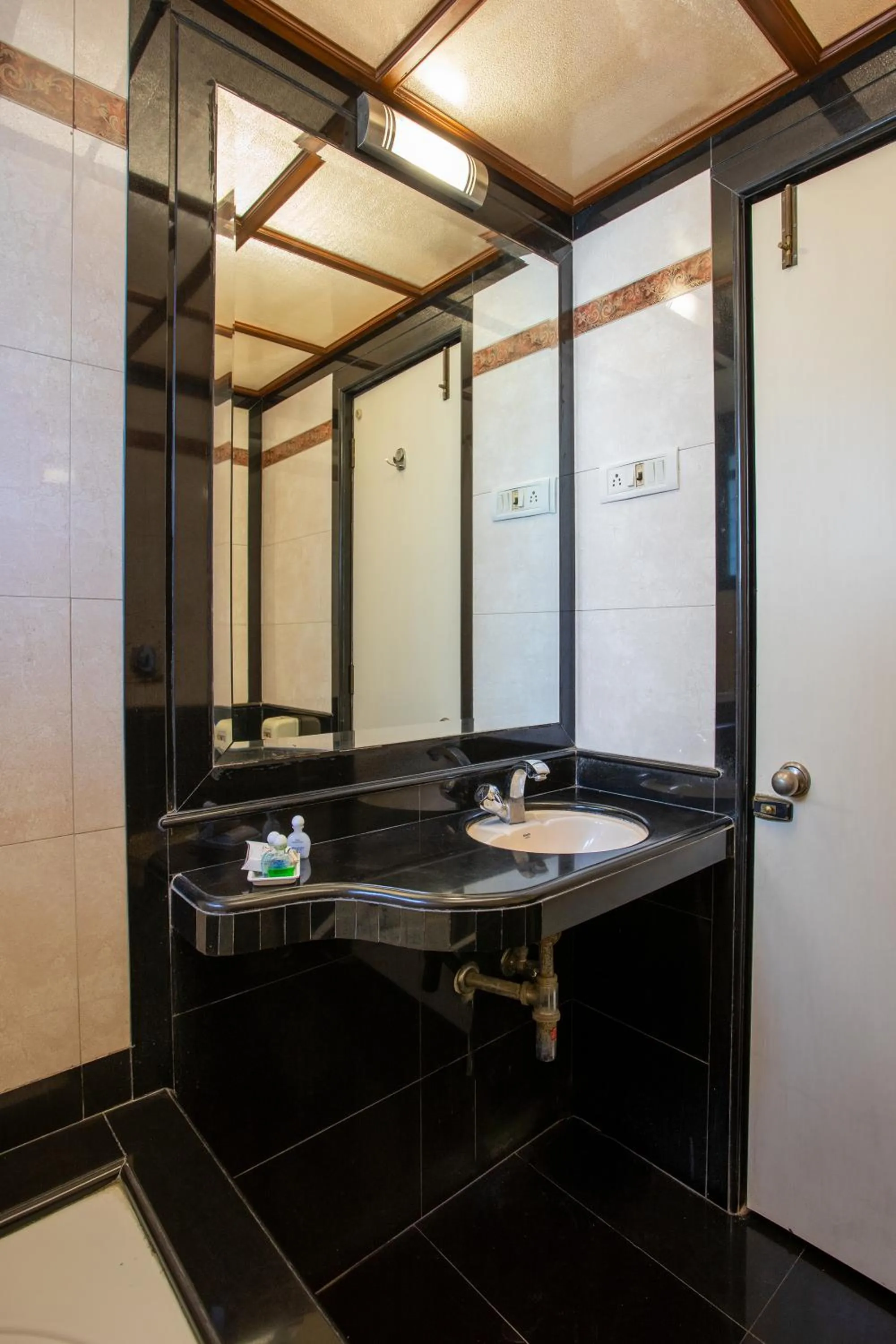 Bathroom in Hotel Dwaraka Residency