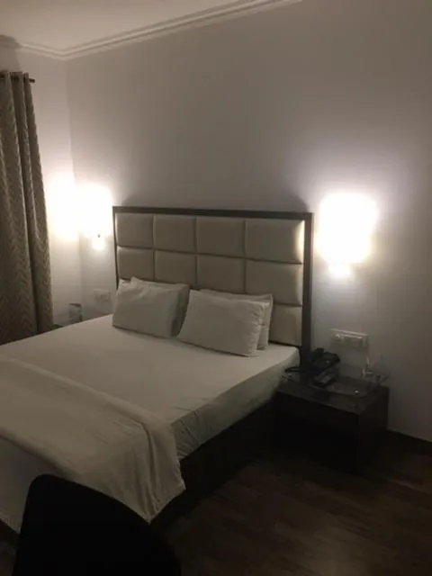 Bed in Shiva Oasis Resort