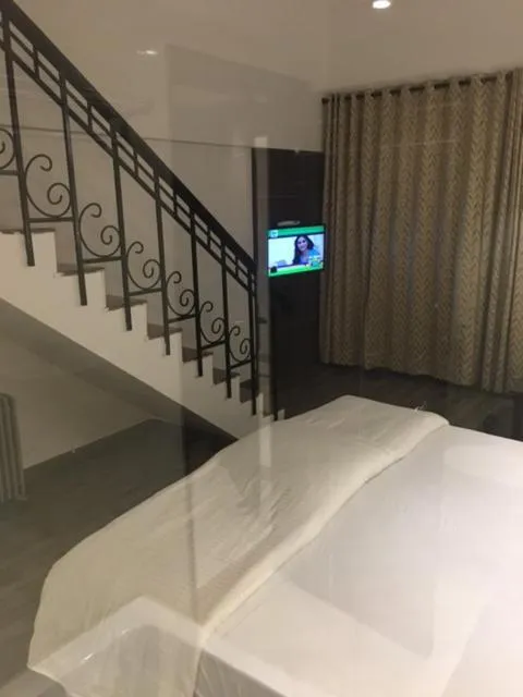 Bed in Shiva Oasis Resort