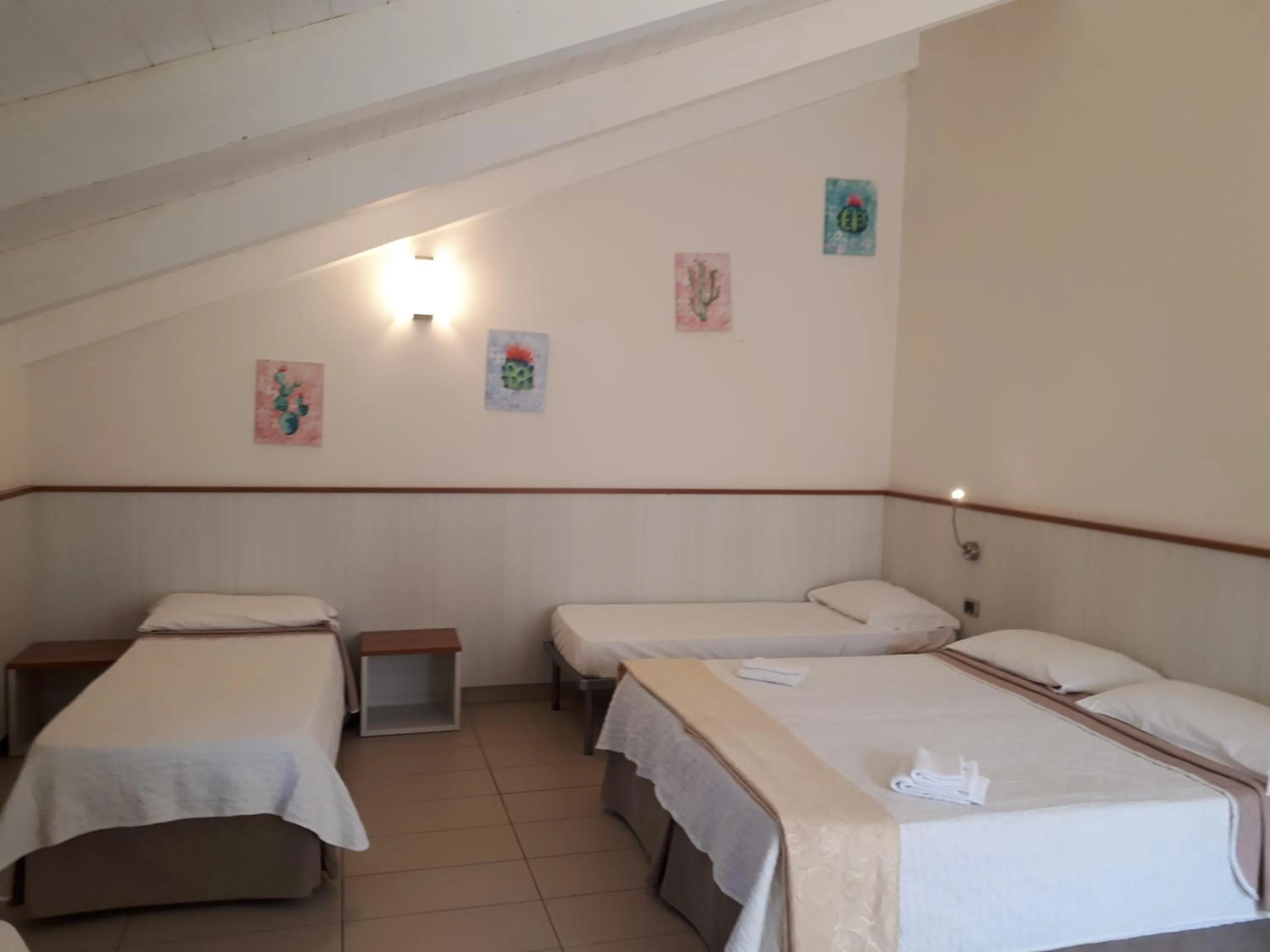 Quadruple Room in Seven Hostel & Rooms