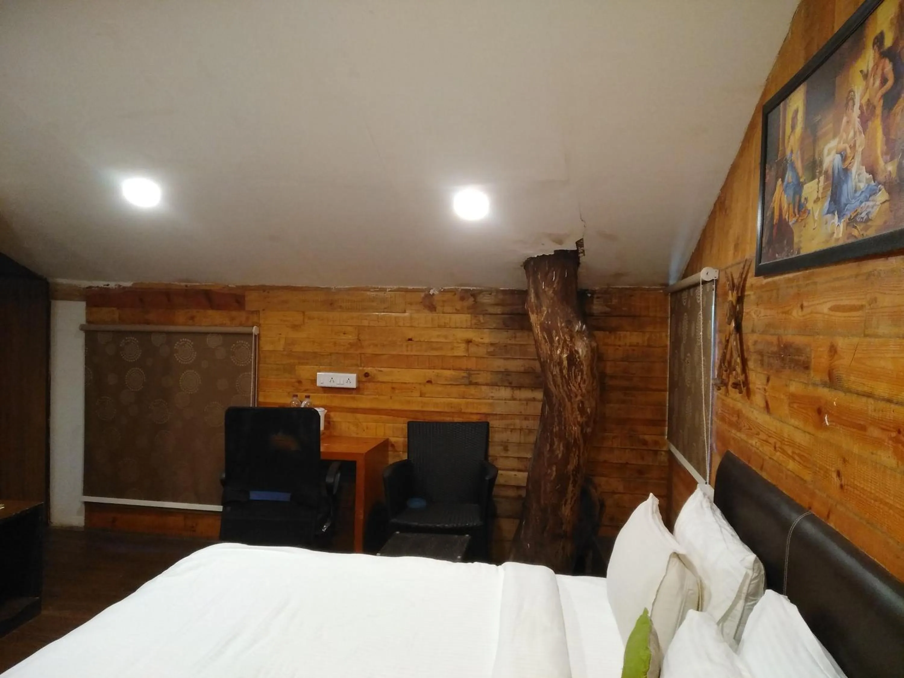 Bedroom in Mrugavani Resort & Spa