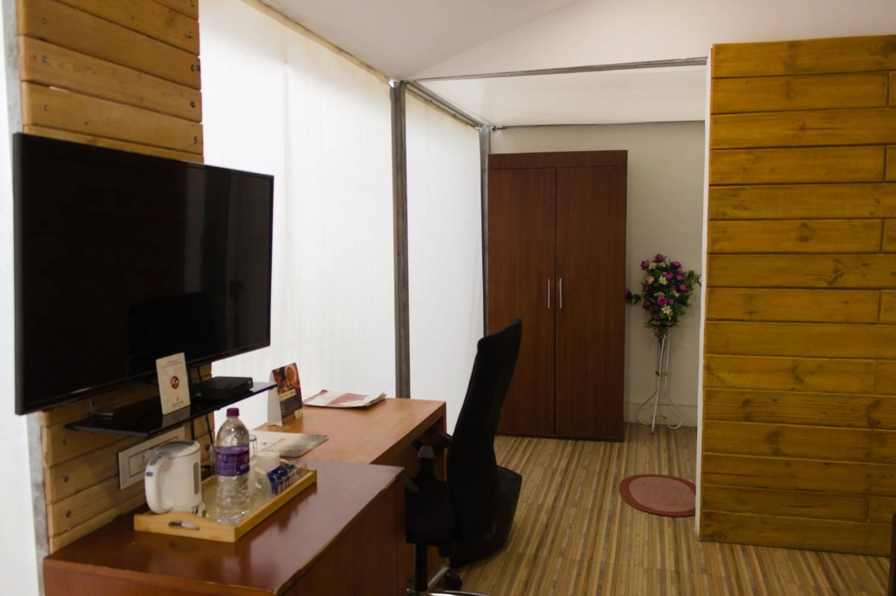 Bedroom in Mrugavani Resort & Spa