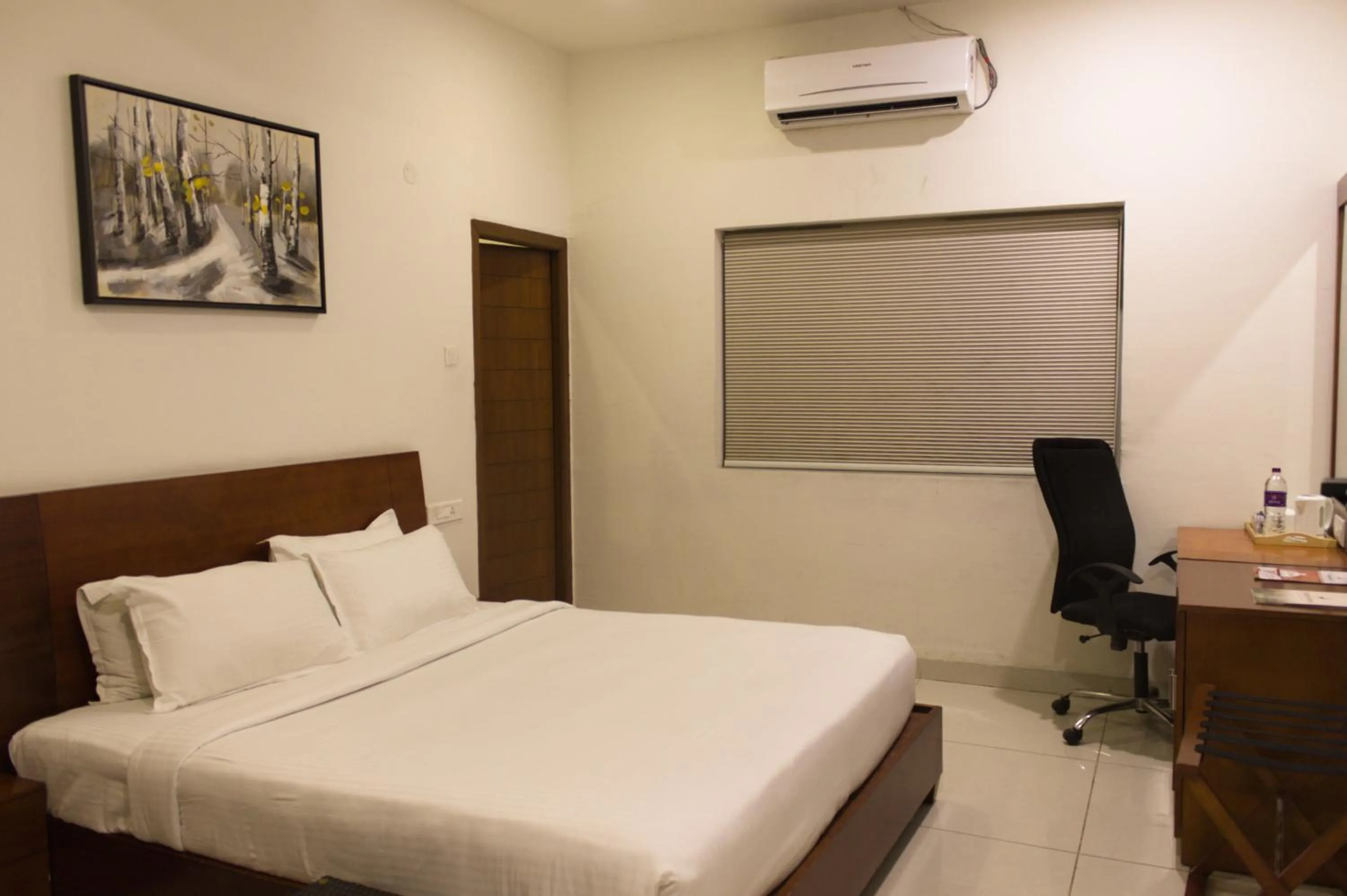 Bedroom in Mrugavani Resort & Spa