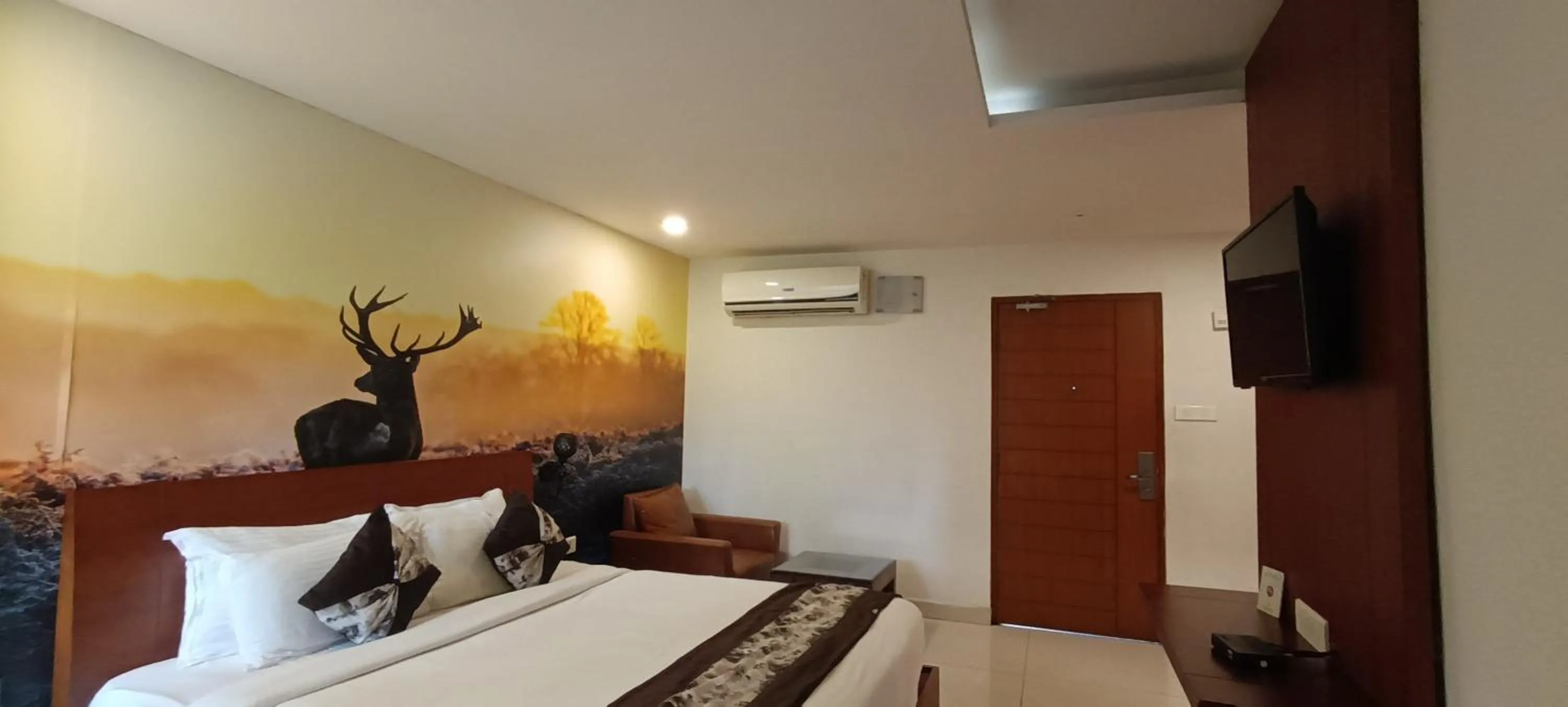 Bedroom in Mrugavani Resort & Spa