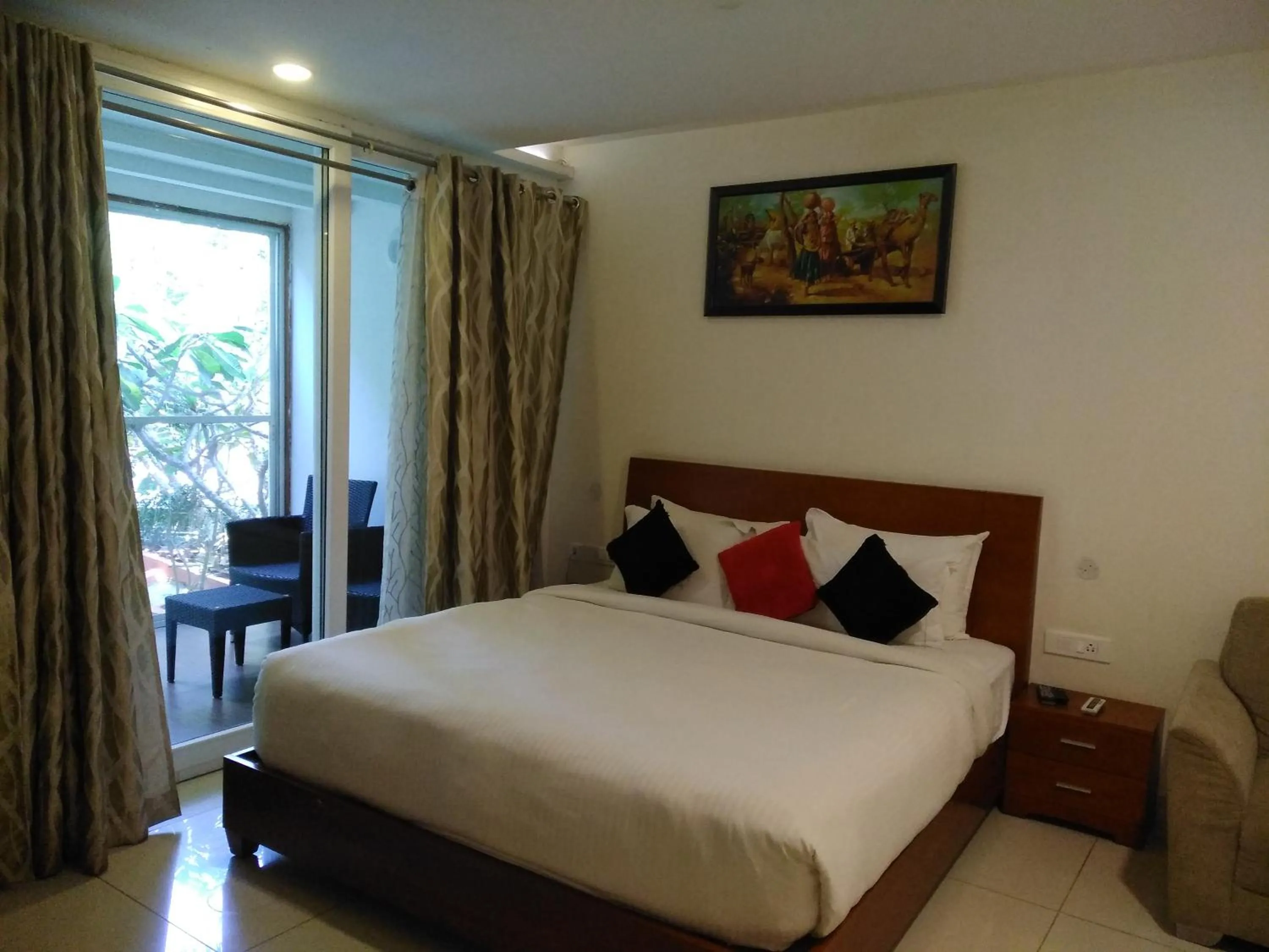 Bedroom in Mrugavani Resort & Spa