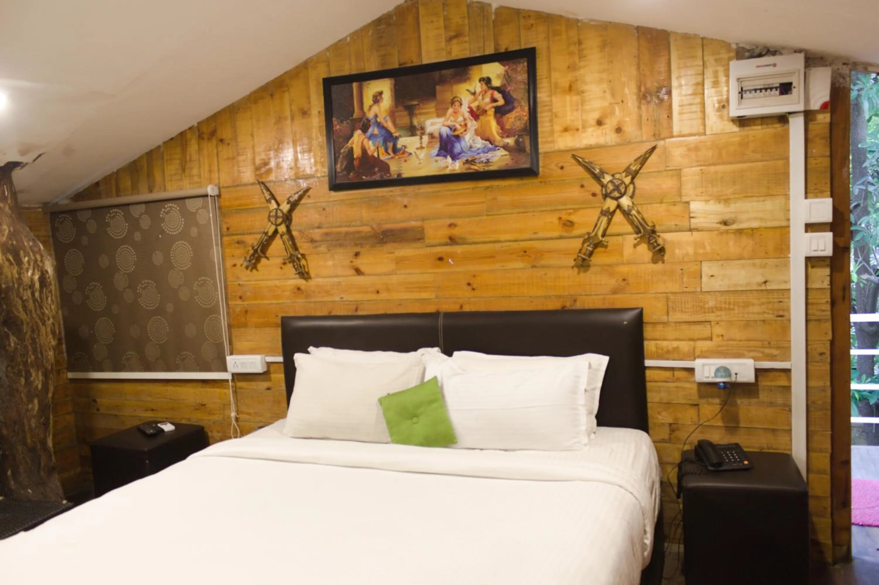 Bedroom in Mrugavani Resort & Spa