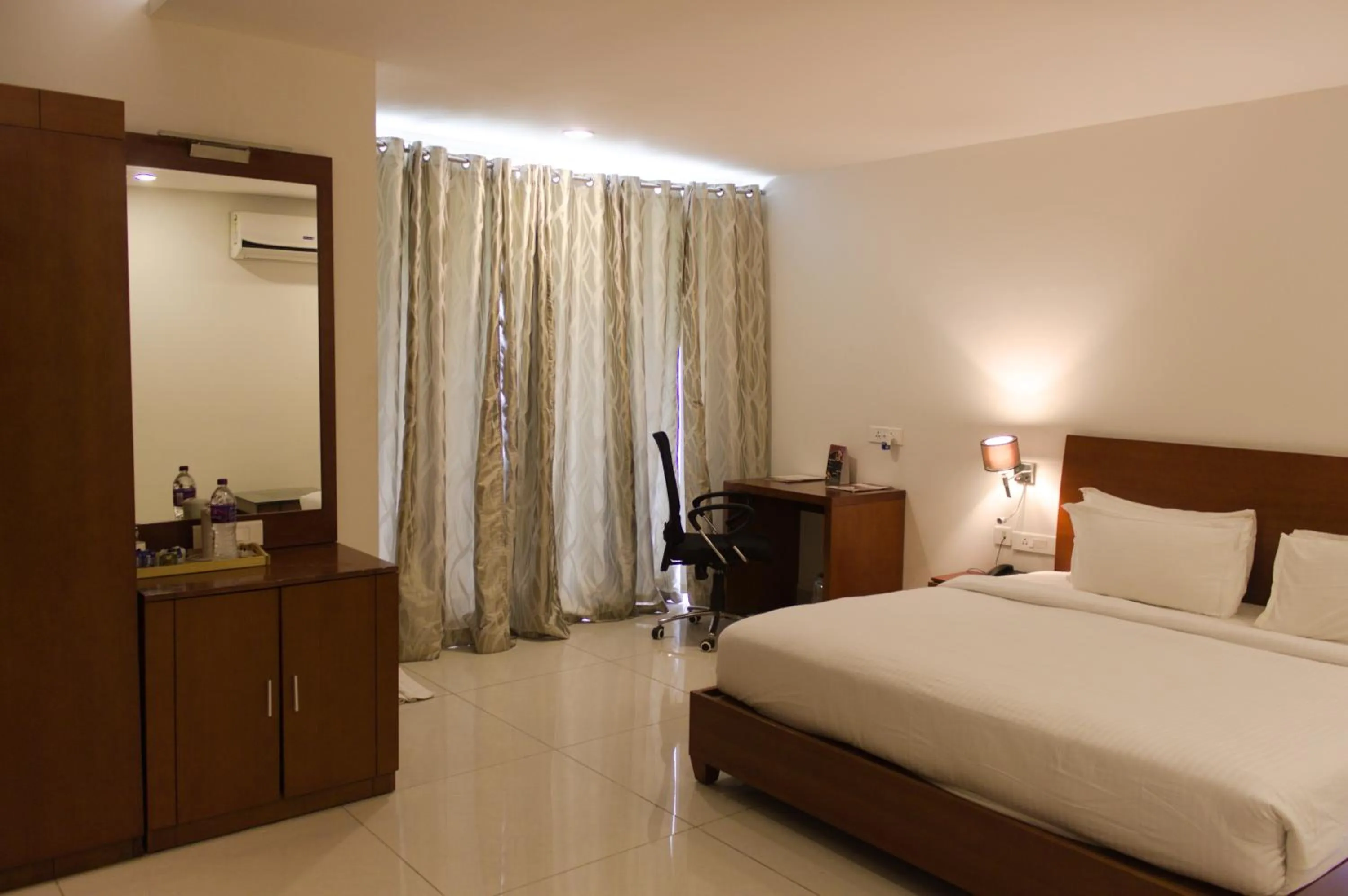 Bedroom in Mrugavani Resort & Spa