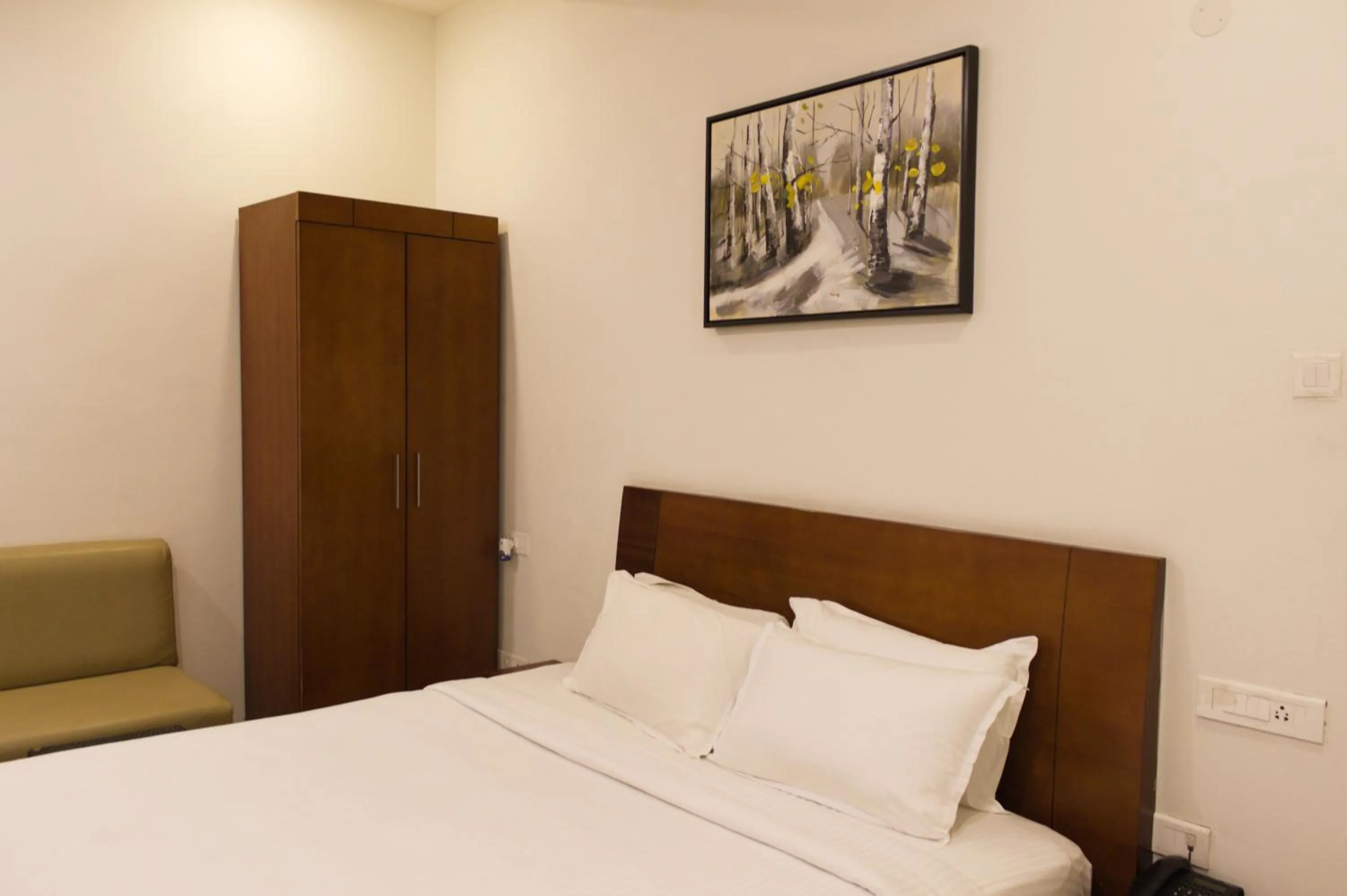 Bedroom in Mrugavani Resort & Spa