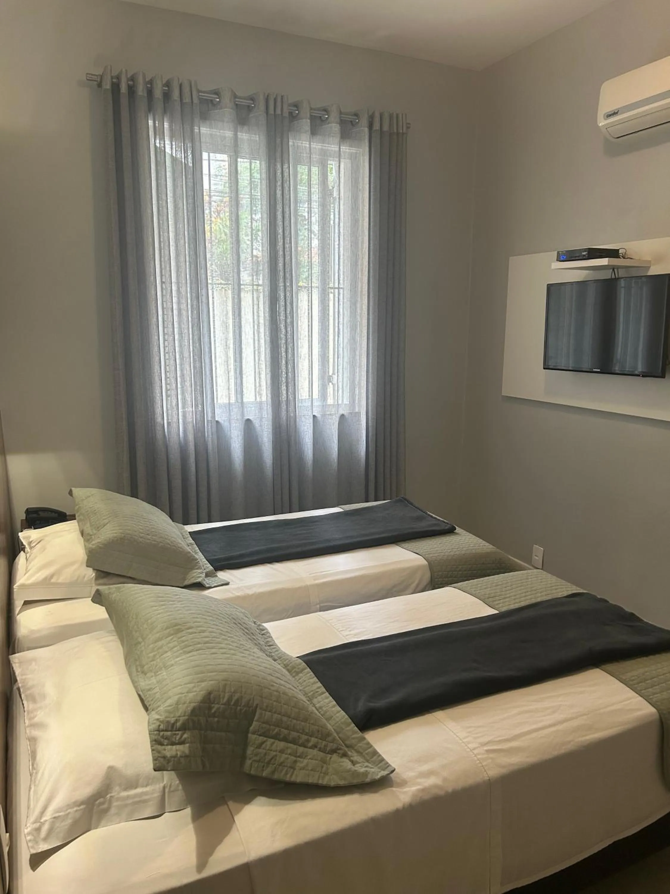 Bed in Hotel Petit Village Icaraí