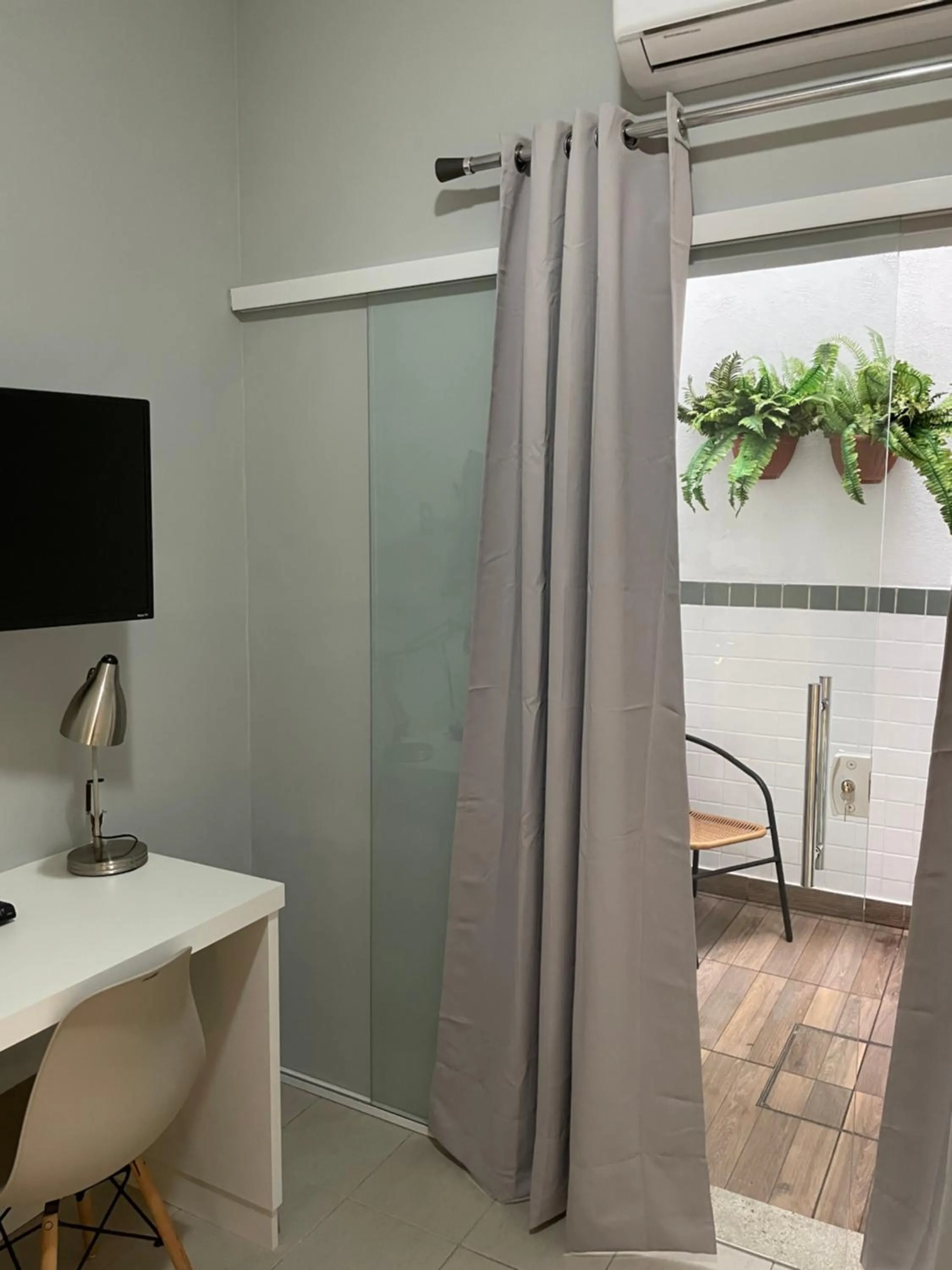 TV and multimedia in Hotel Petit Village Icaraí