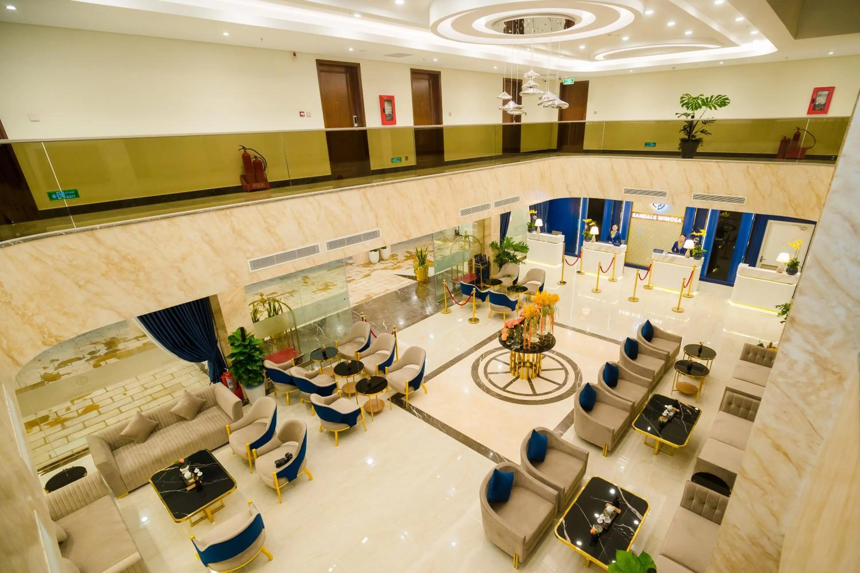 Communal lounge/ TV room in Sandals Mimosa