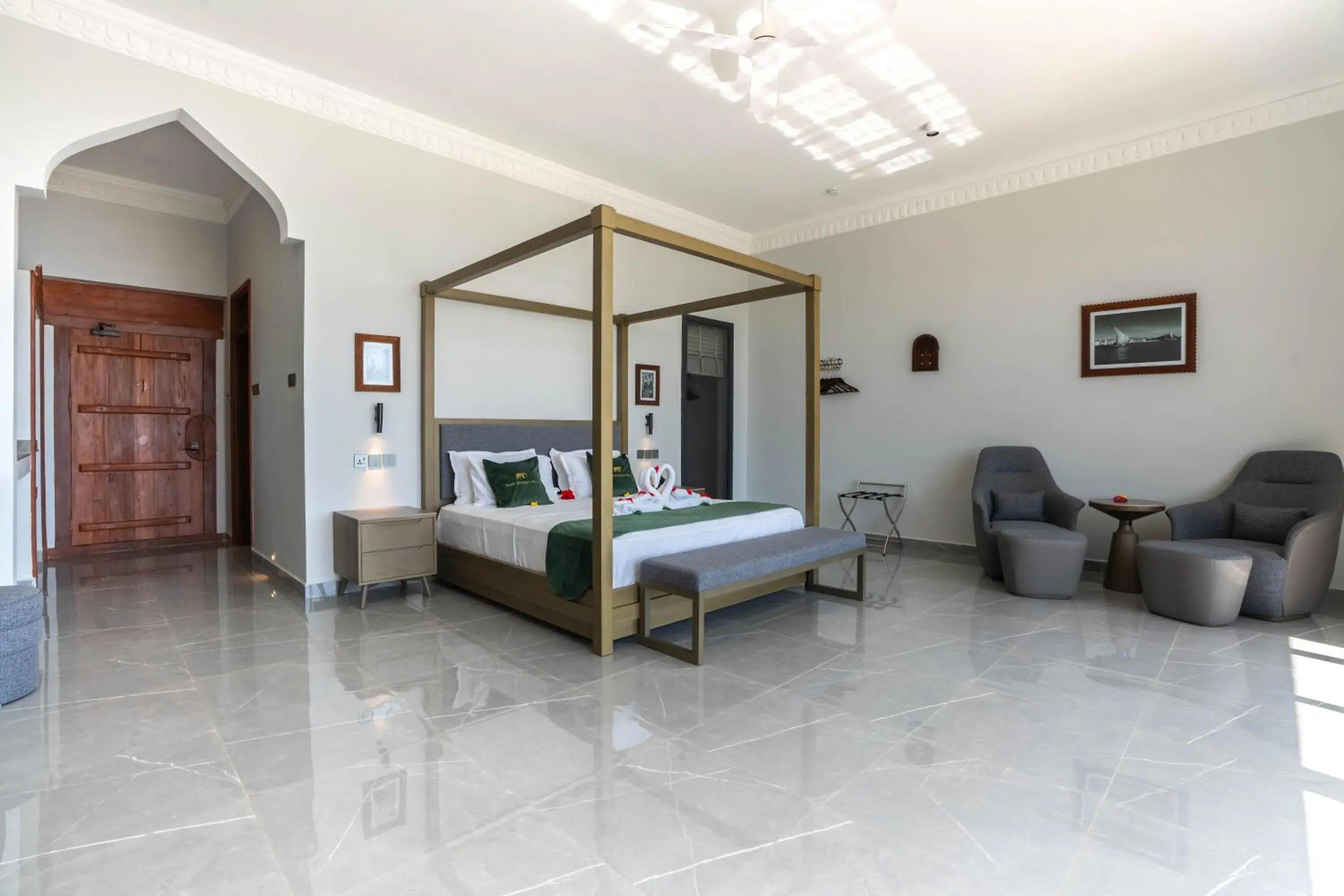 Suite with Balcony Pool View & Sea View in Tembo Kiwengwa Resort Suite with Balcony Pool View & Sea View in Tembo Kiwengwa Resort