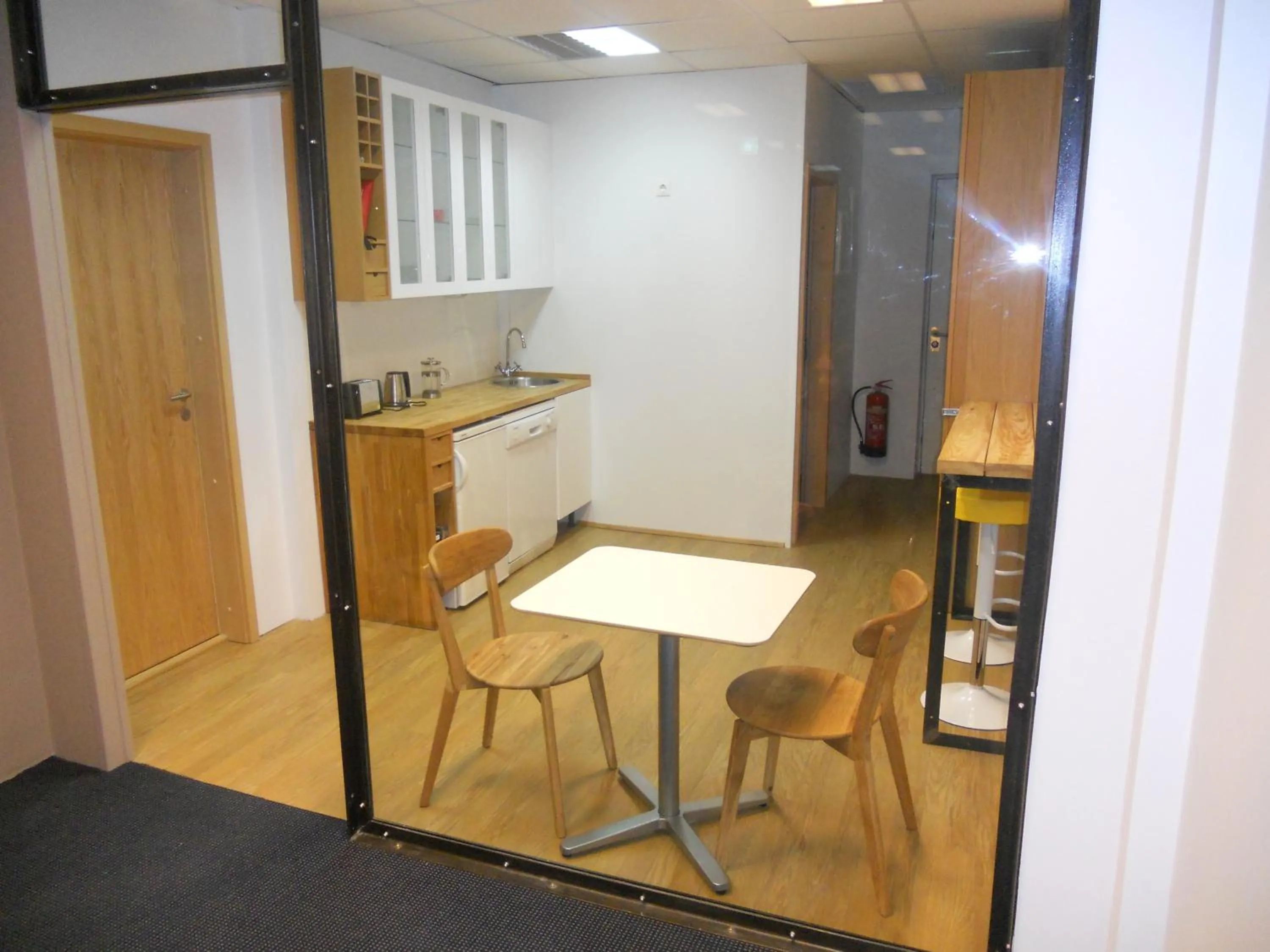 Kitchen or kitchenette in REK Inn