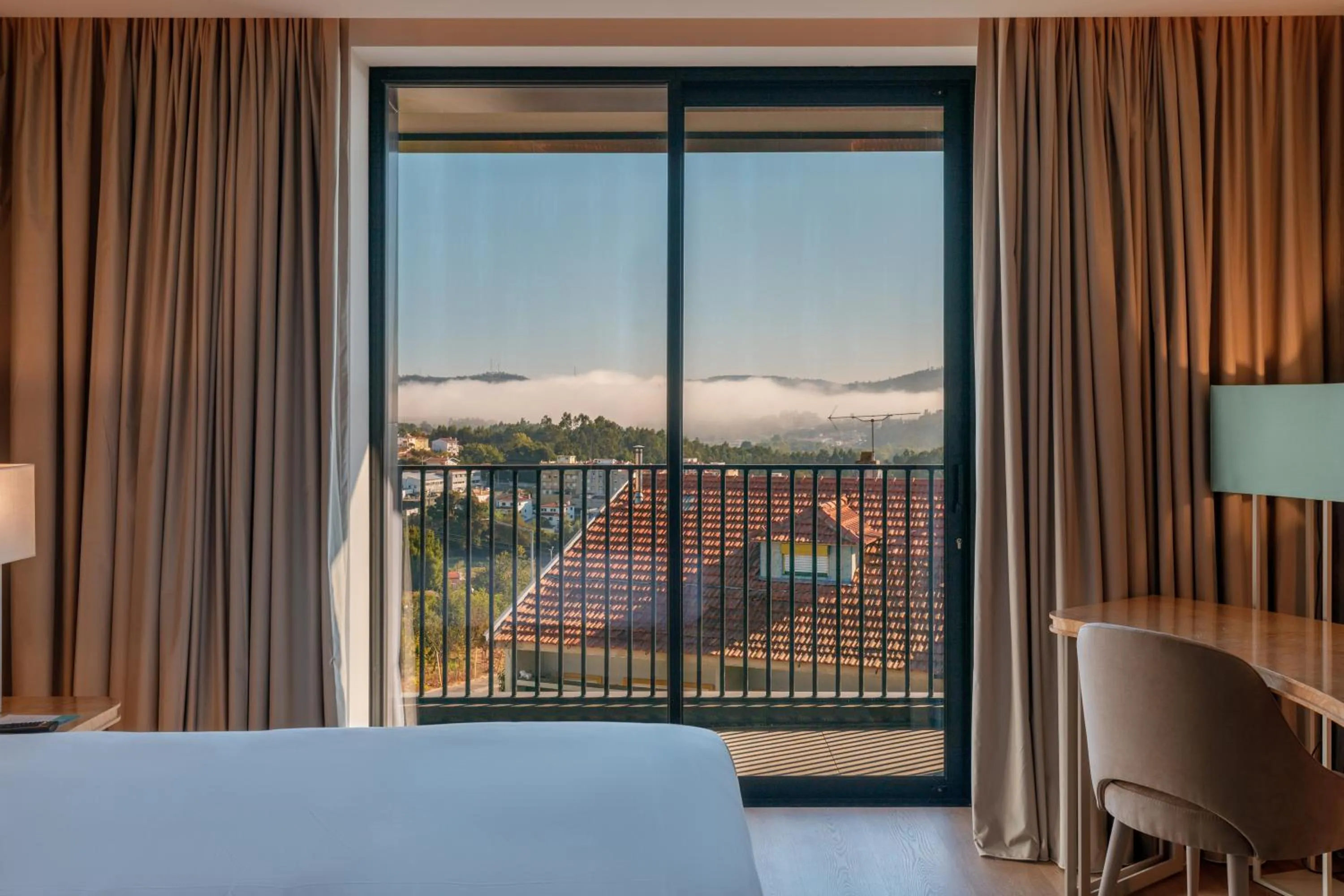 View (from property/room), Bed in Meliá São João da Madeira