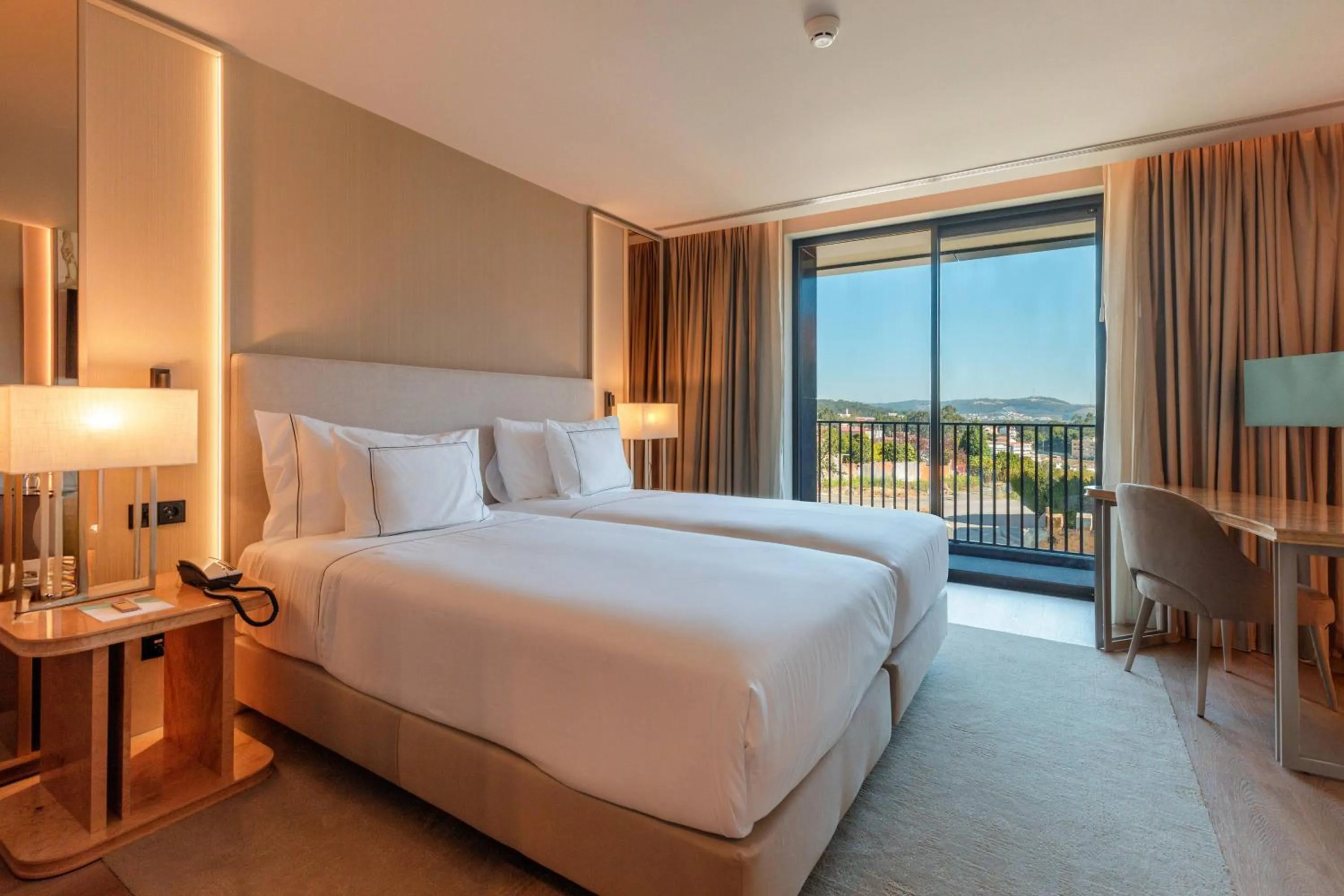 Property building, Bed in Meliá São João da Madeira