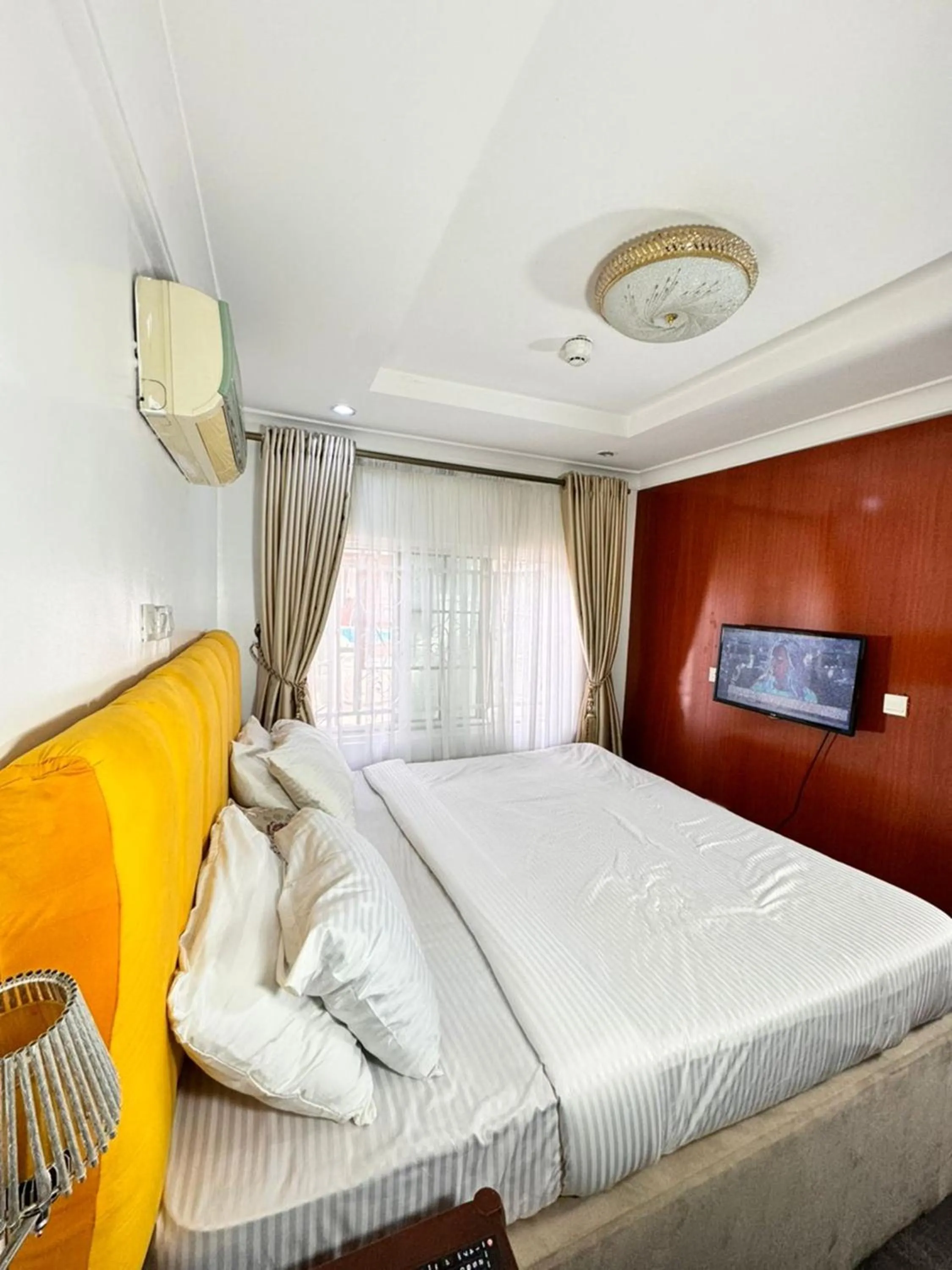 Bed in Lake 47 Suites Ltd