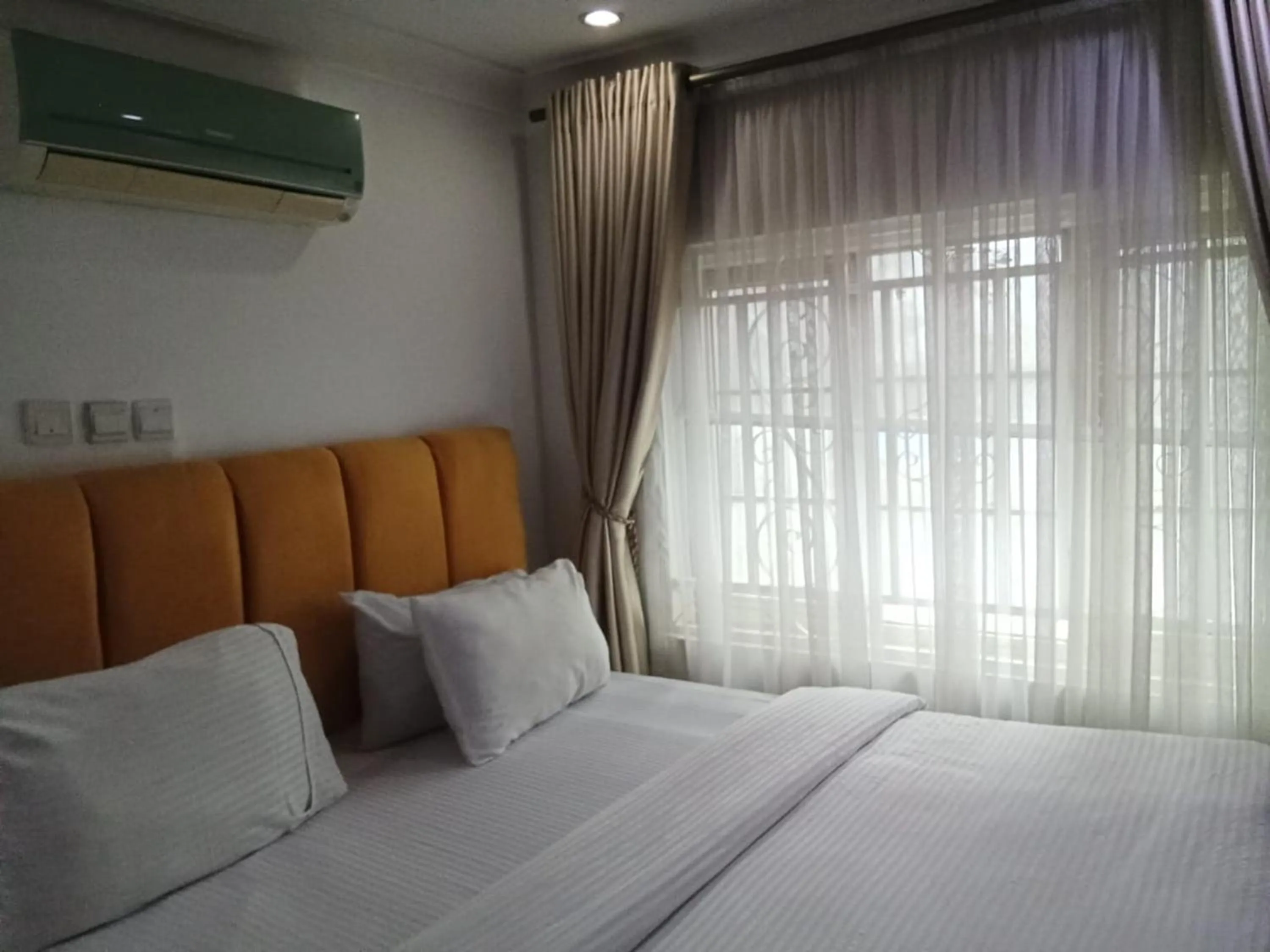 Bed in Lake 47 Suites Ltd