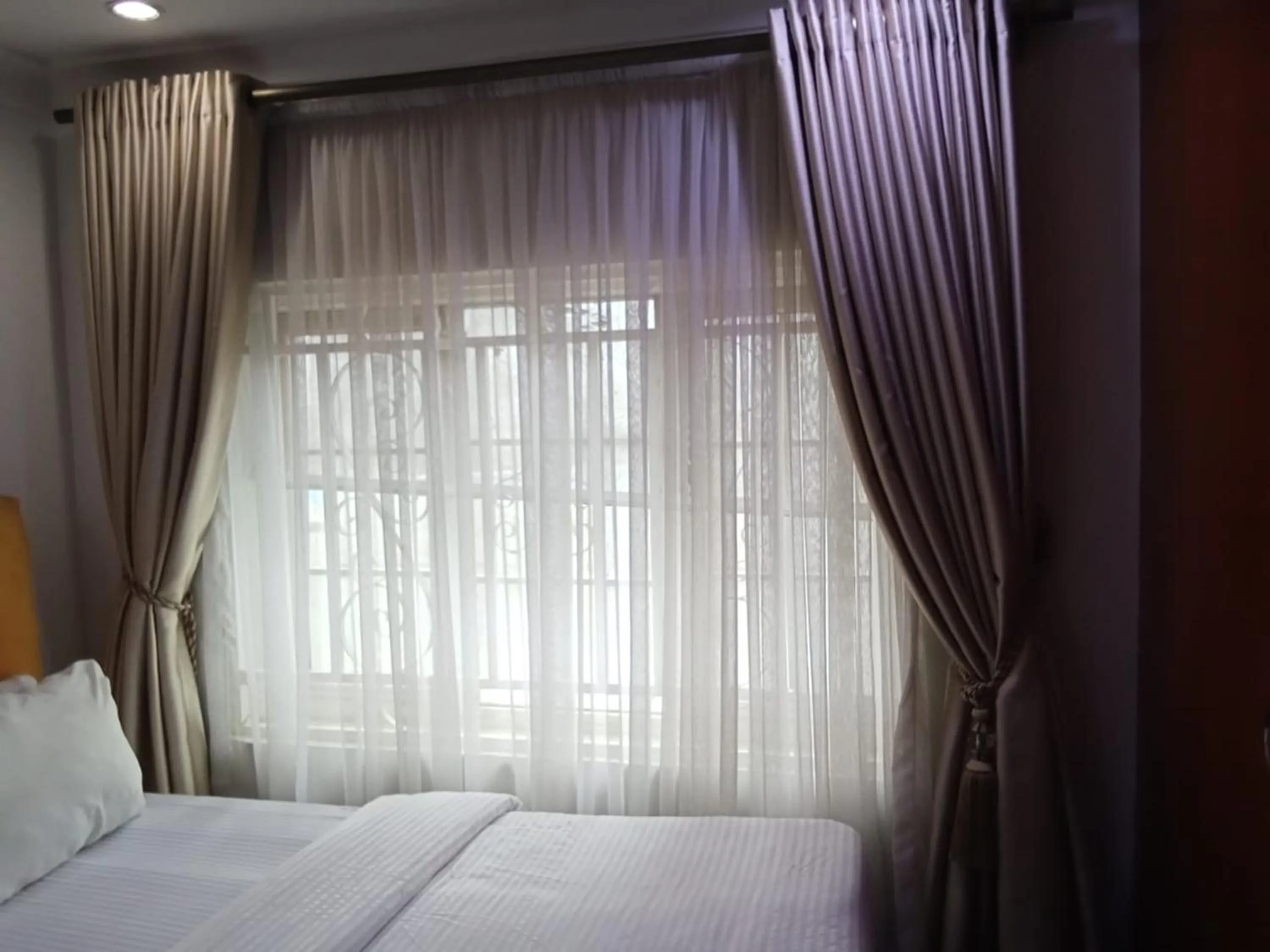 Bed in Lake 47 Suites Ltd