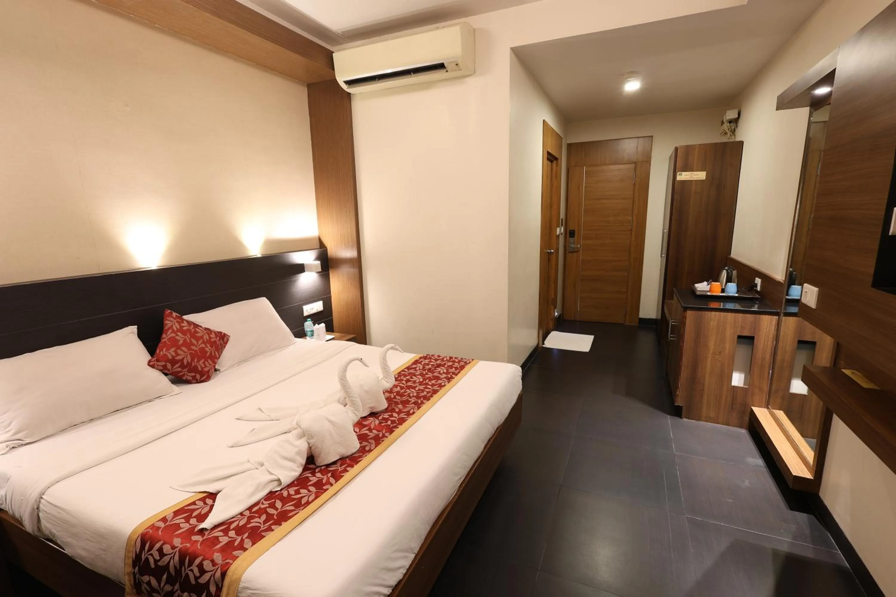 Bed in Abirami Residency