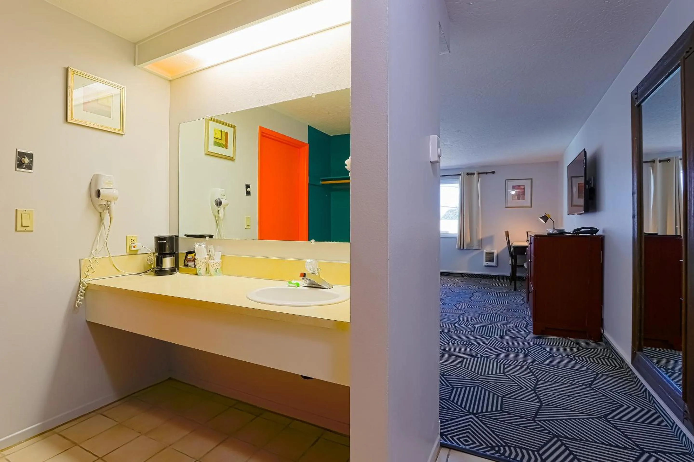 Bathroom in Coast River Inn by OYO Seaside