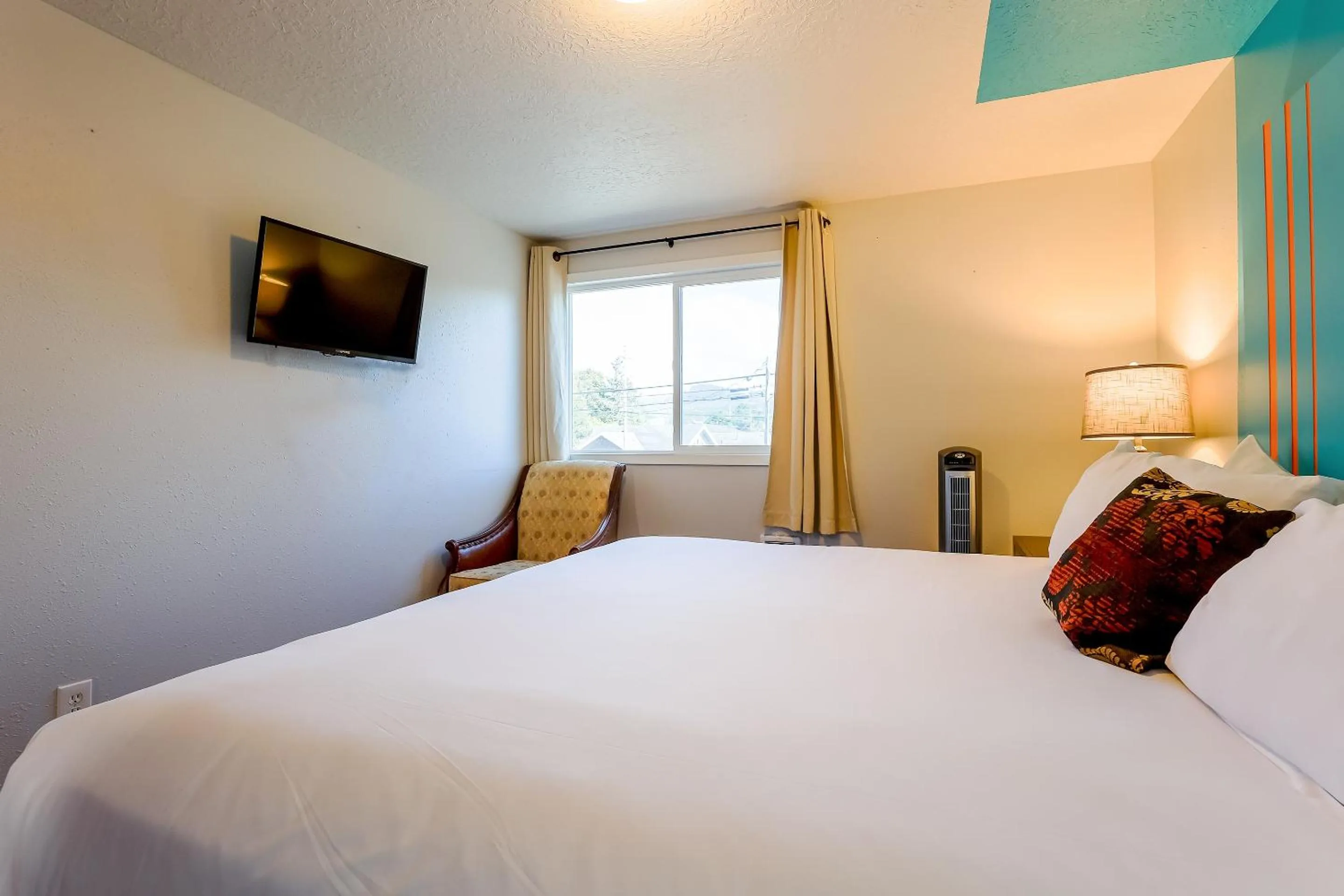 Bedroom, Bed in Coast River Inn by OYO Seaside