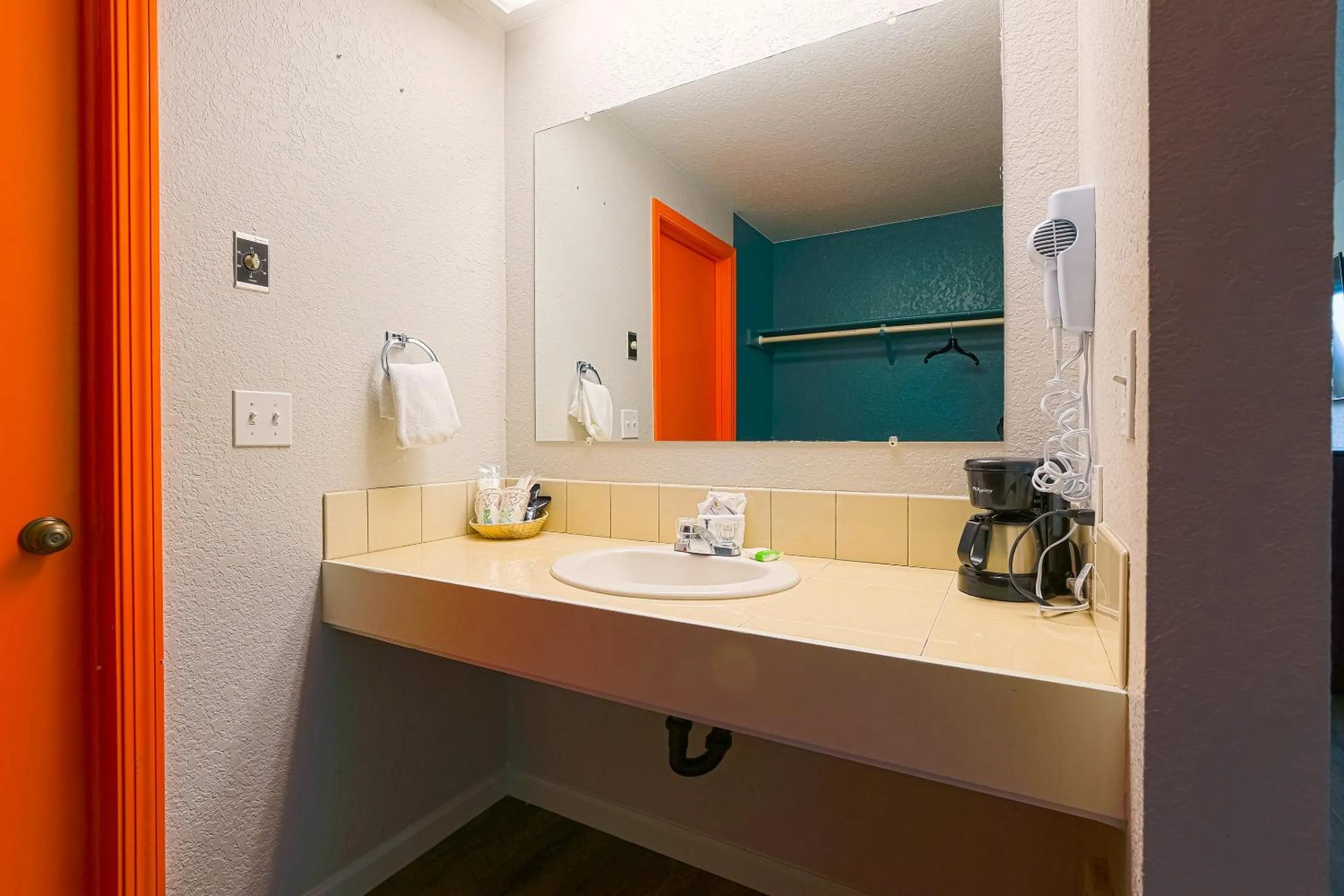 Bathroom in Coast River Inn by OYO Seaside