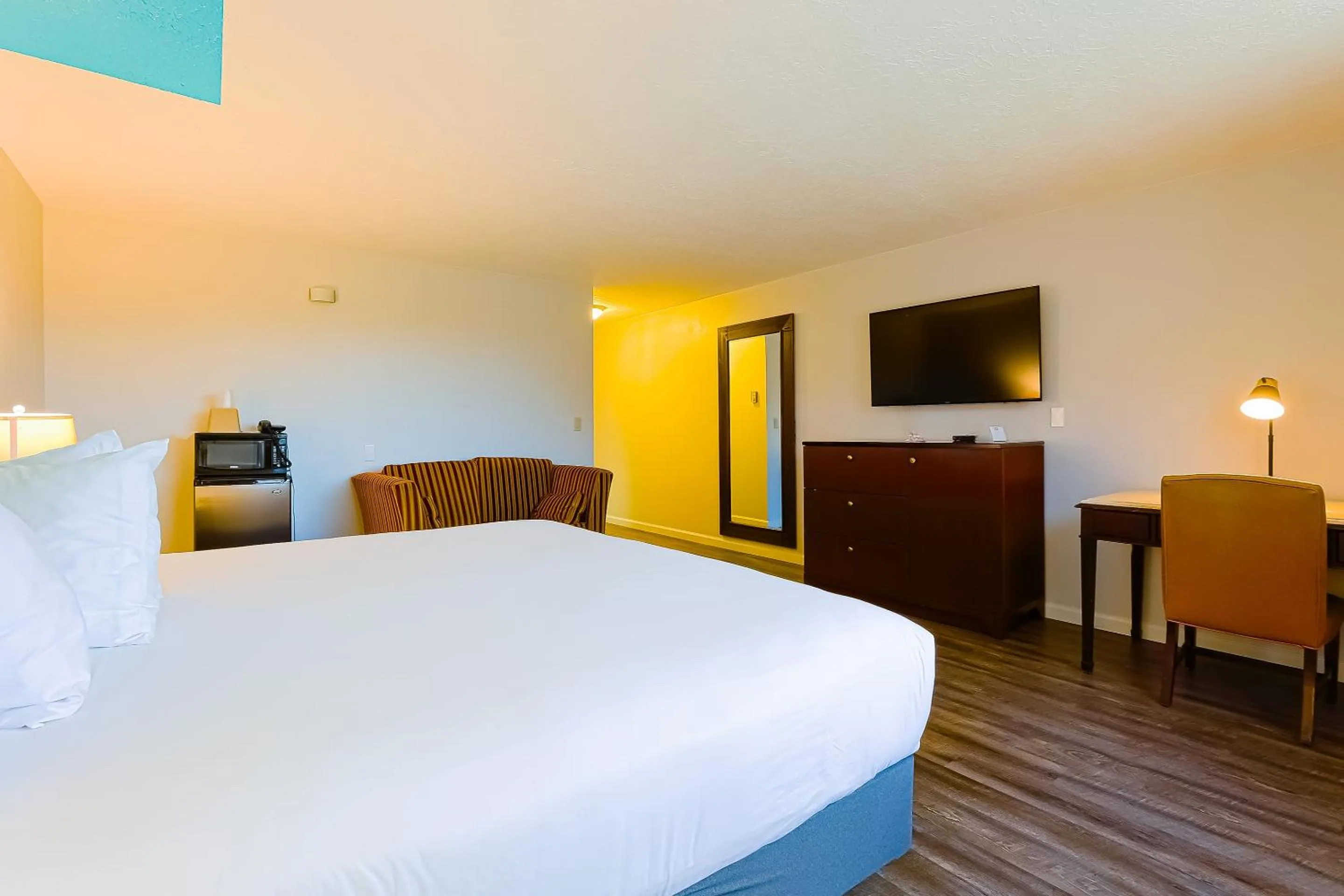 Bedroom, Bed in Coast River Inn by OYO Seaside