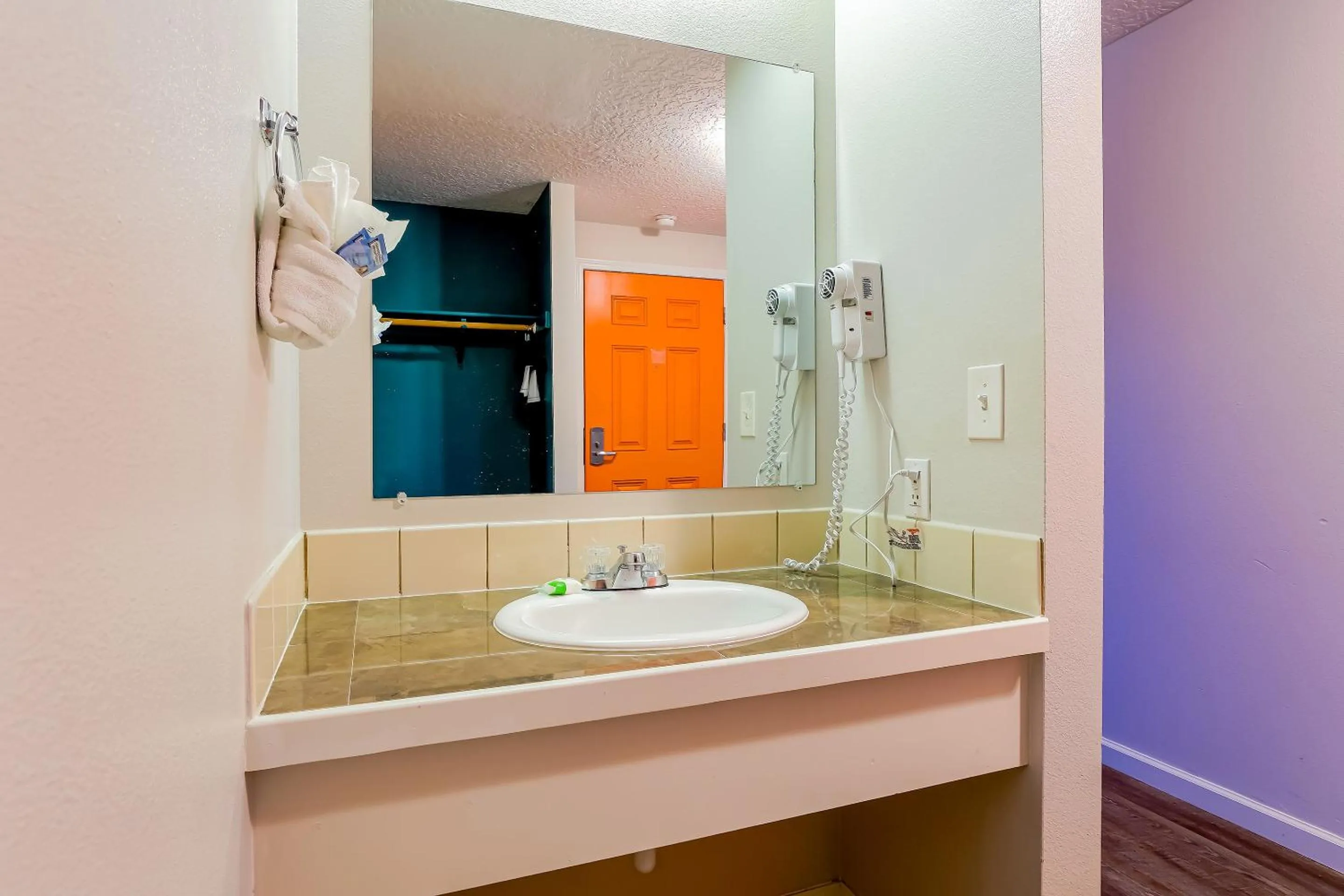 Bathroom in Coast River Inn by OYO Seaside