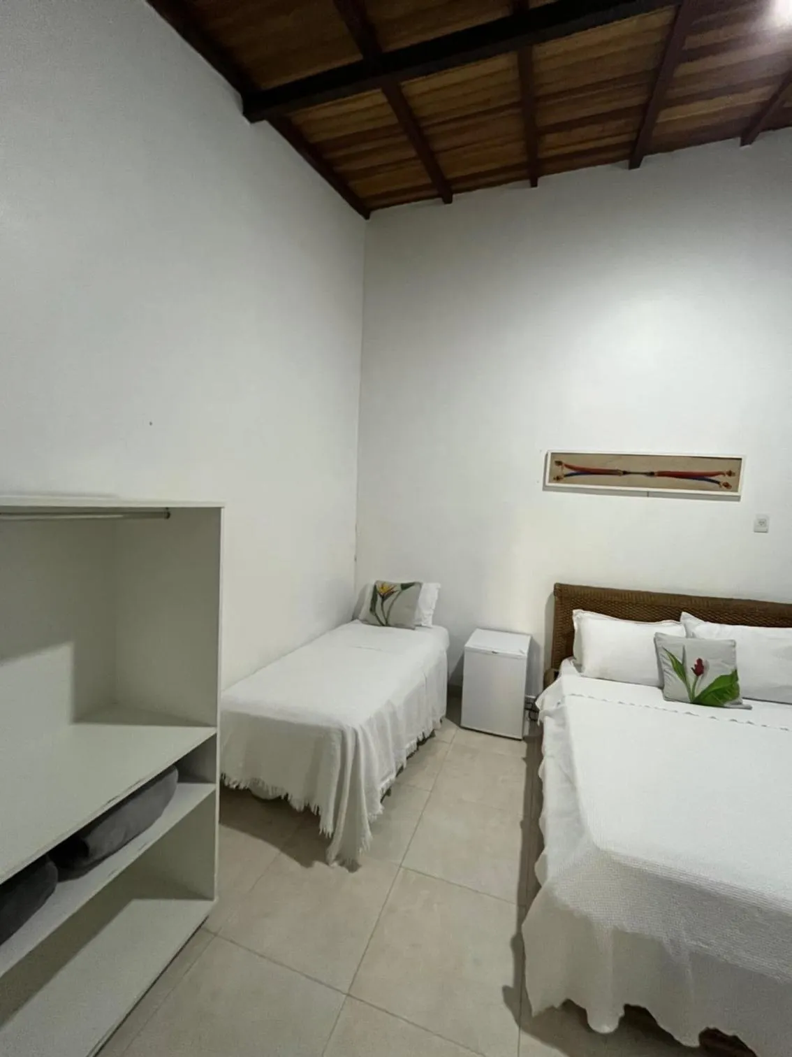 Bed in Pousada Praia e Conforto