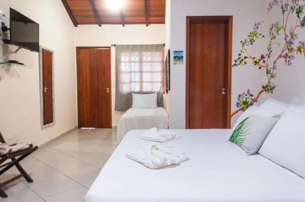 Bed in Pousada Praia e Conforto