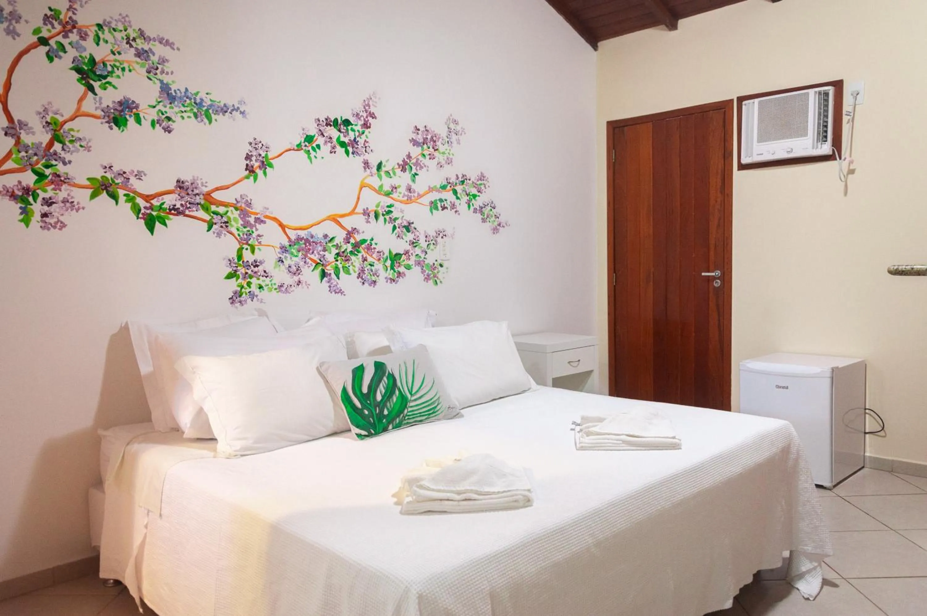 Bed in Pousada Praia e Conforto