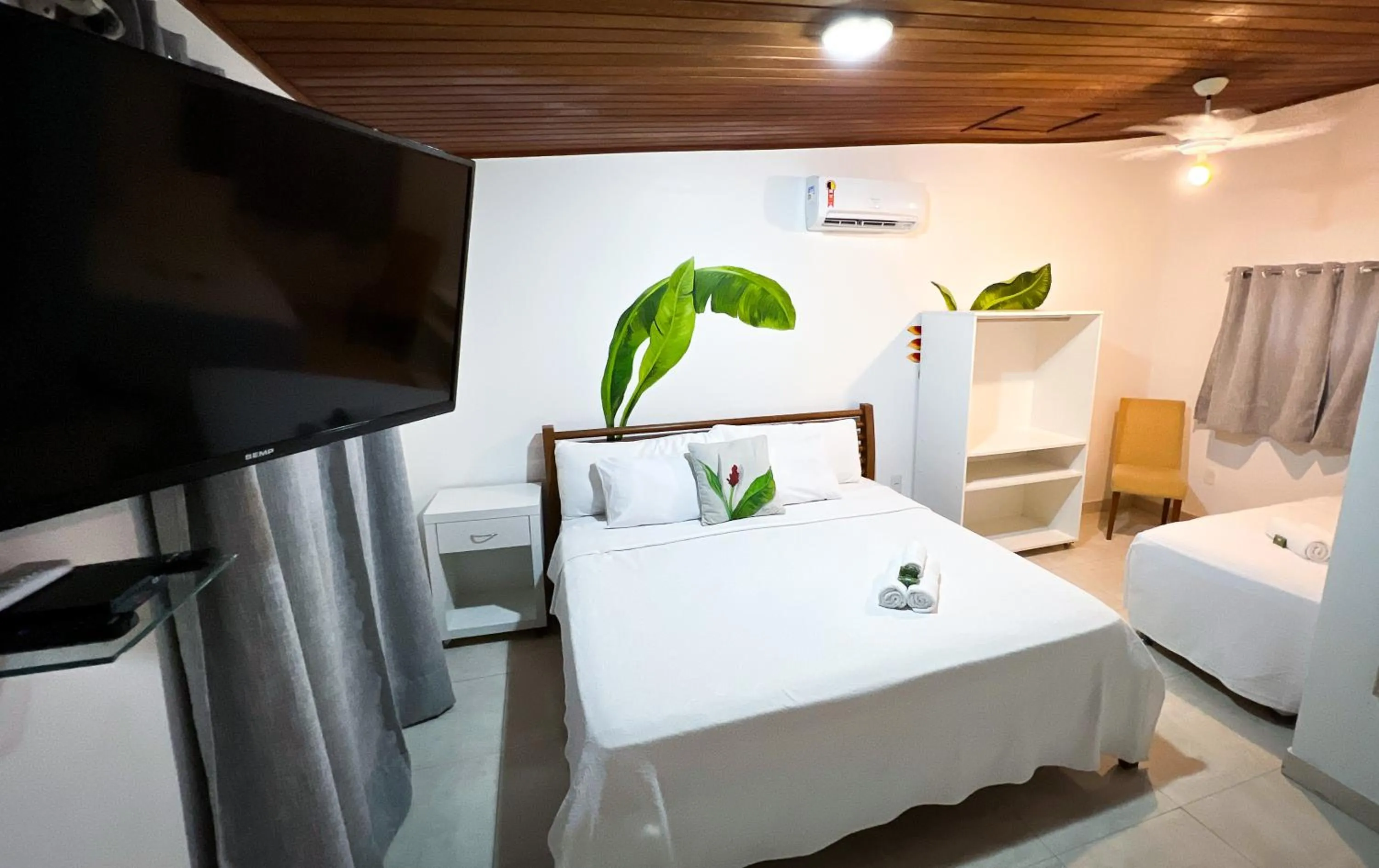 Bed in Pousada Praia e Conforto