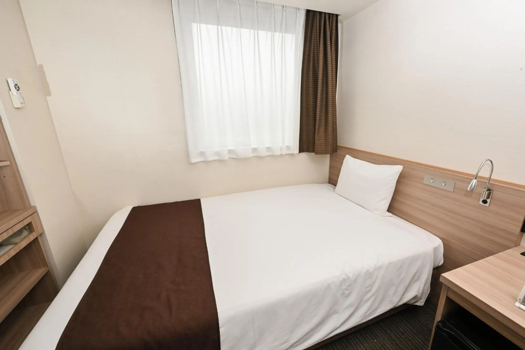 Bed in Sanco Inn Grande Tokyo Hamamatsucho