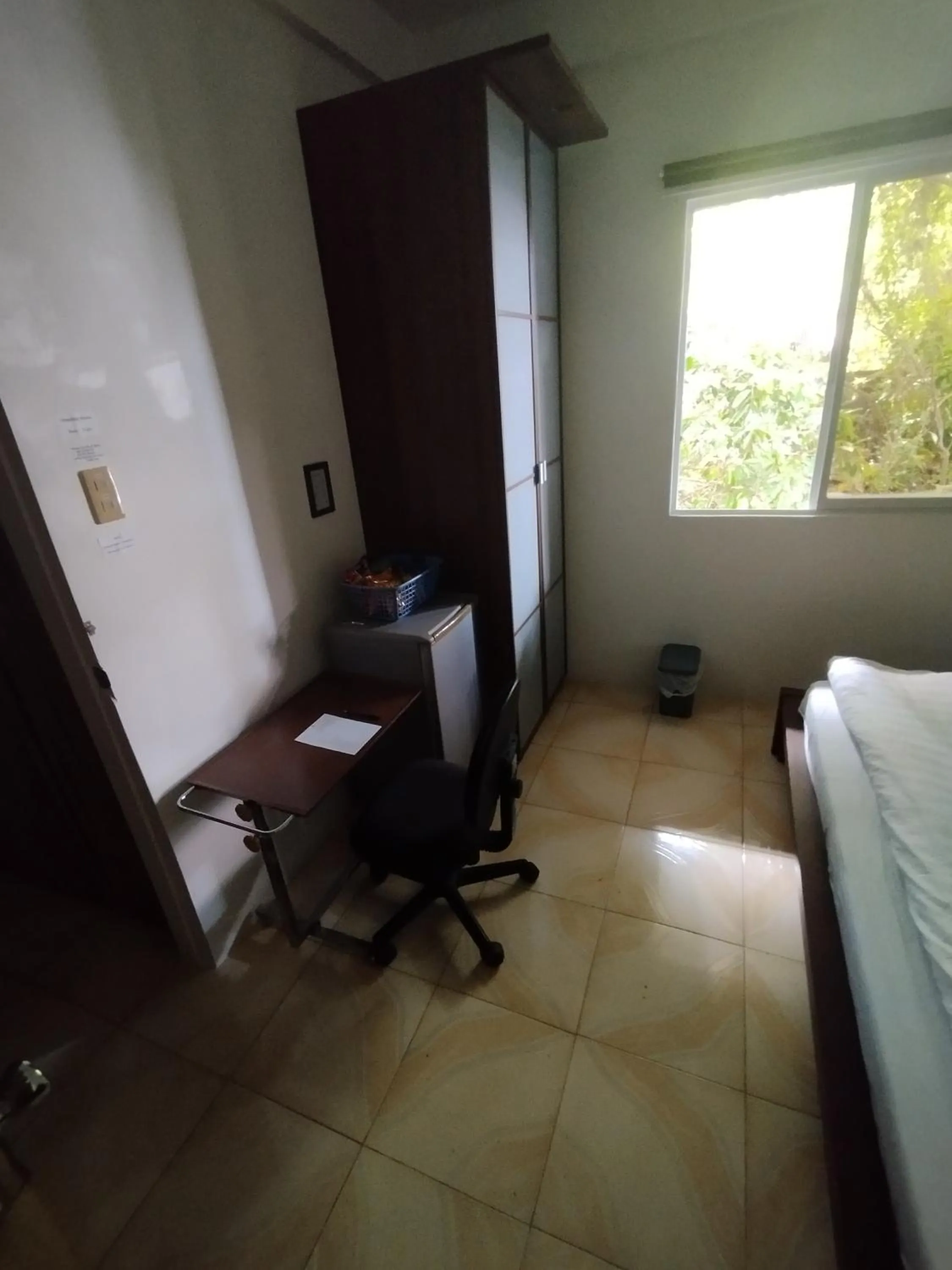 Bed in Roger's Place Guesthouse