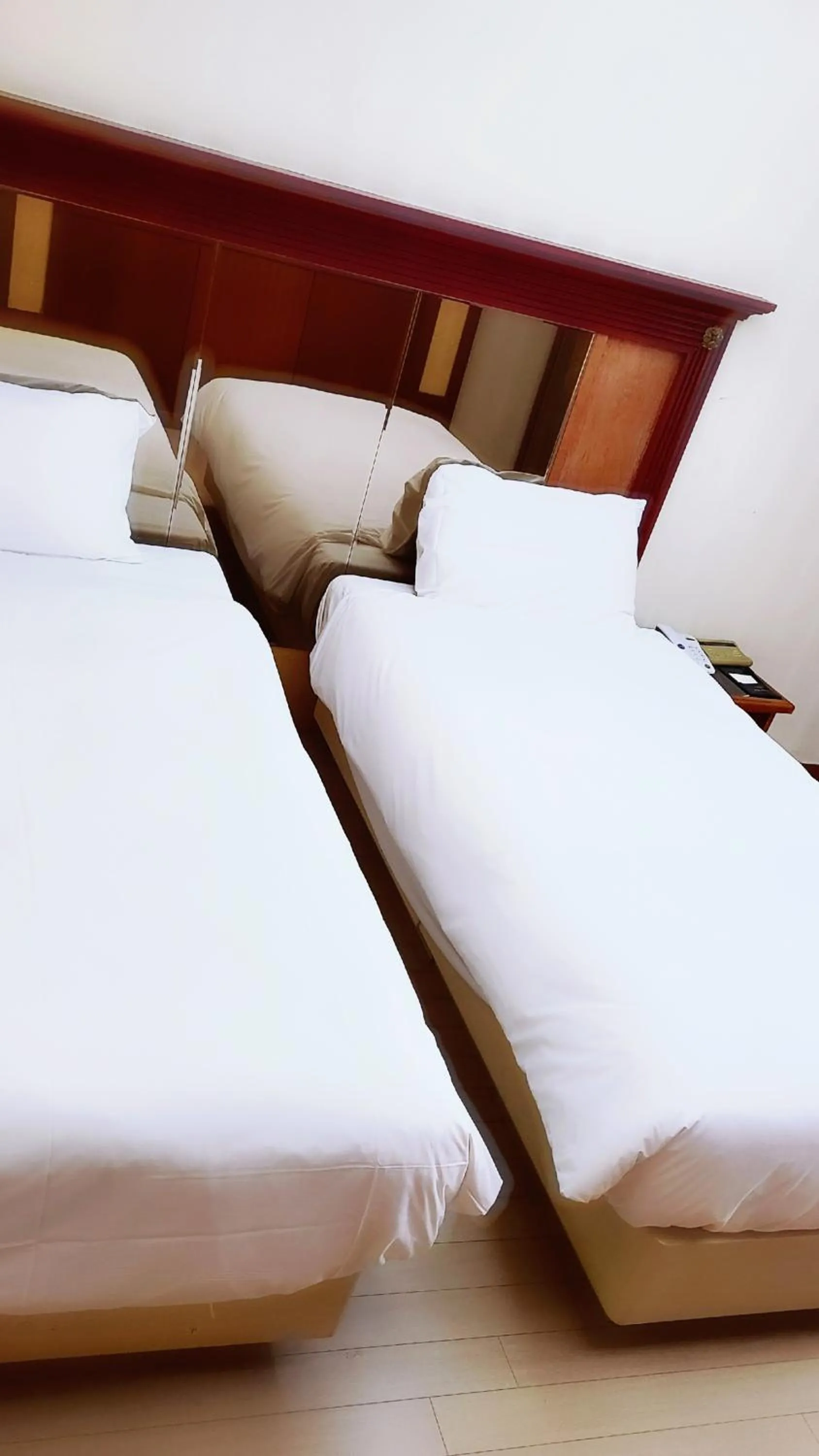 Bed in Charis Hotel