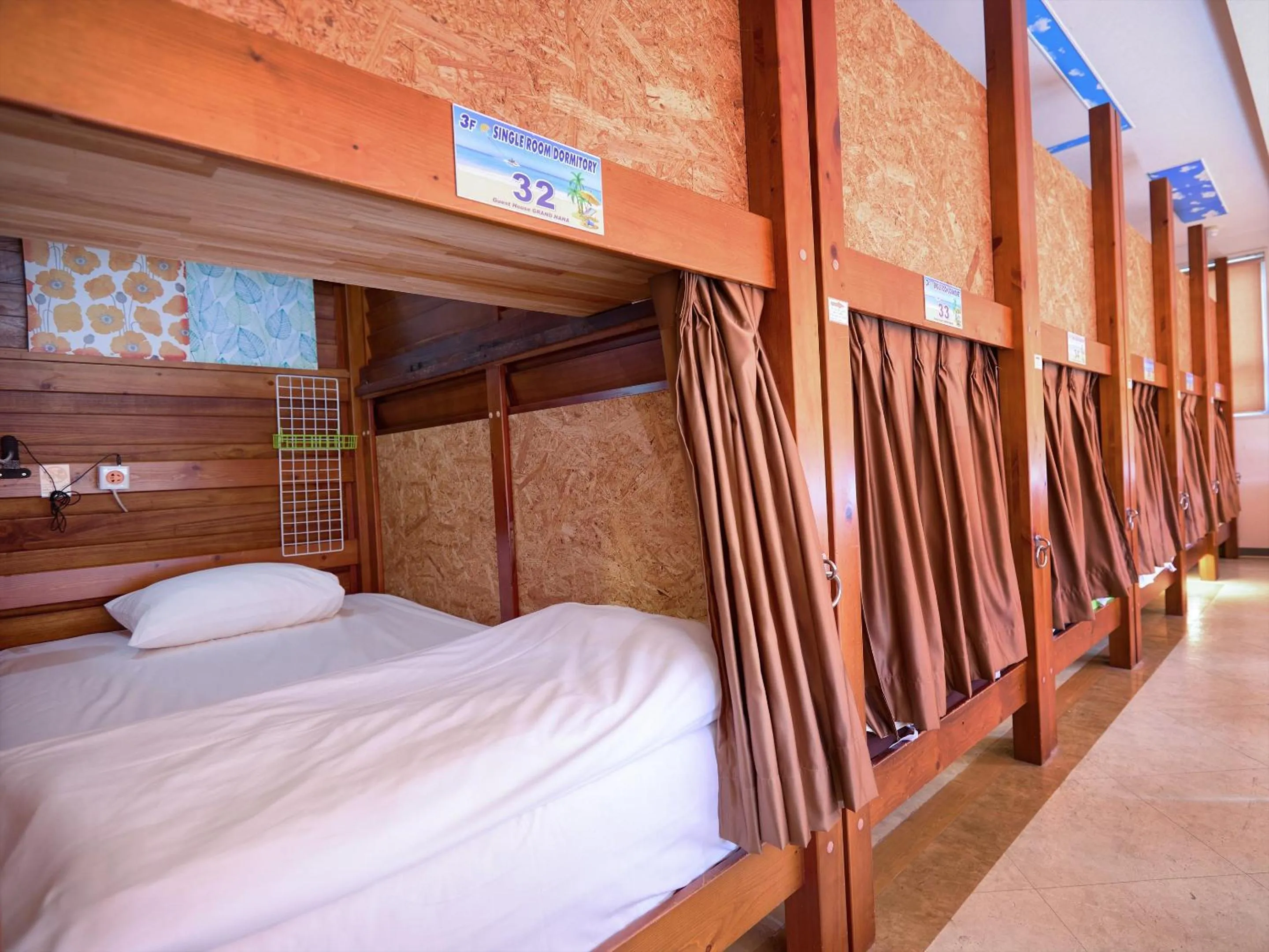 Bed in Guest House Grand Naha