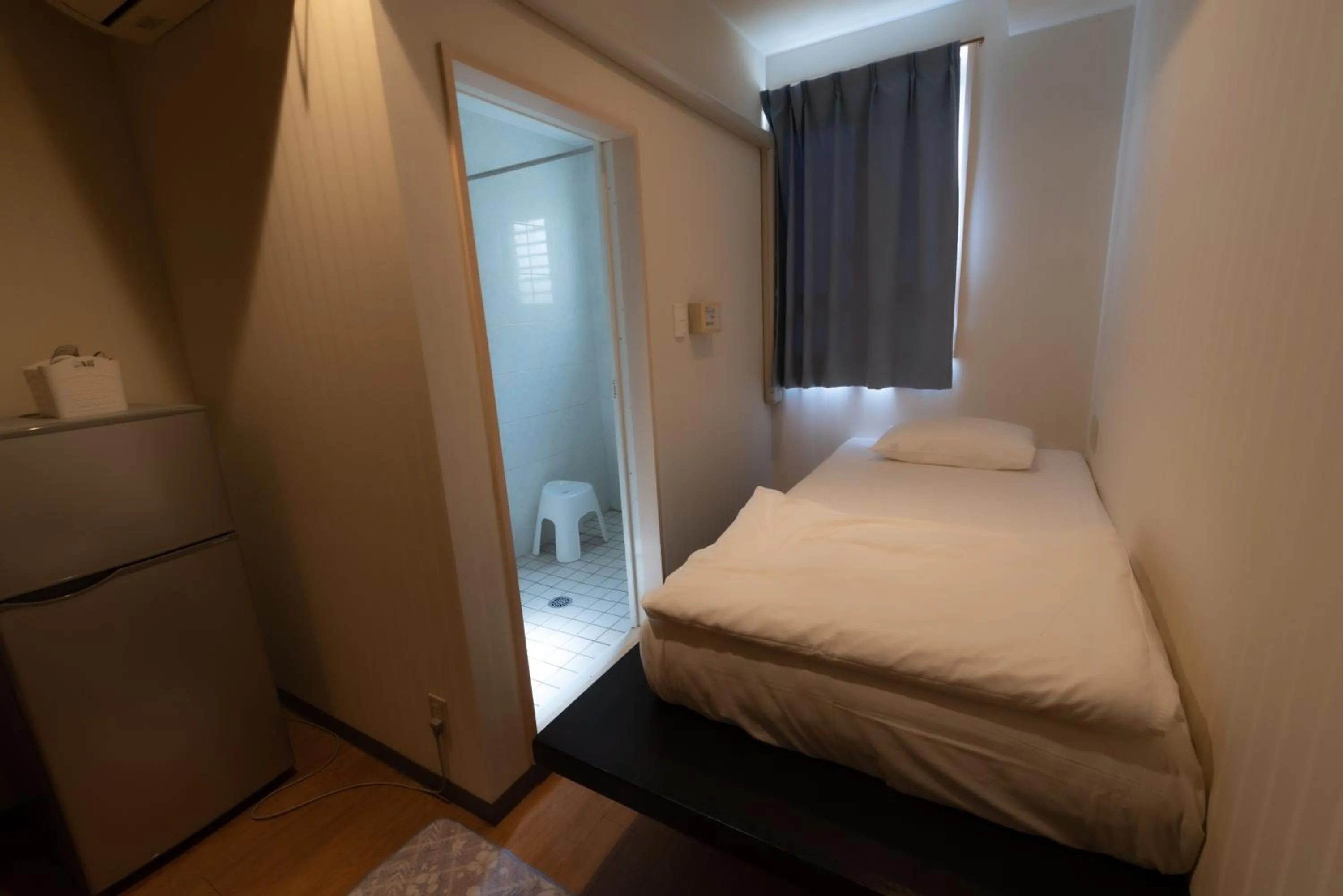 Photo of the whole room in Guest House Grand Naha