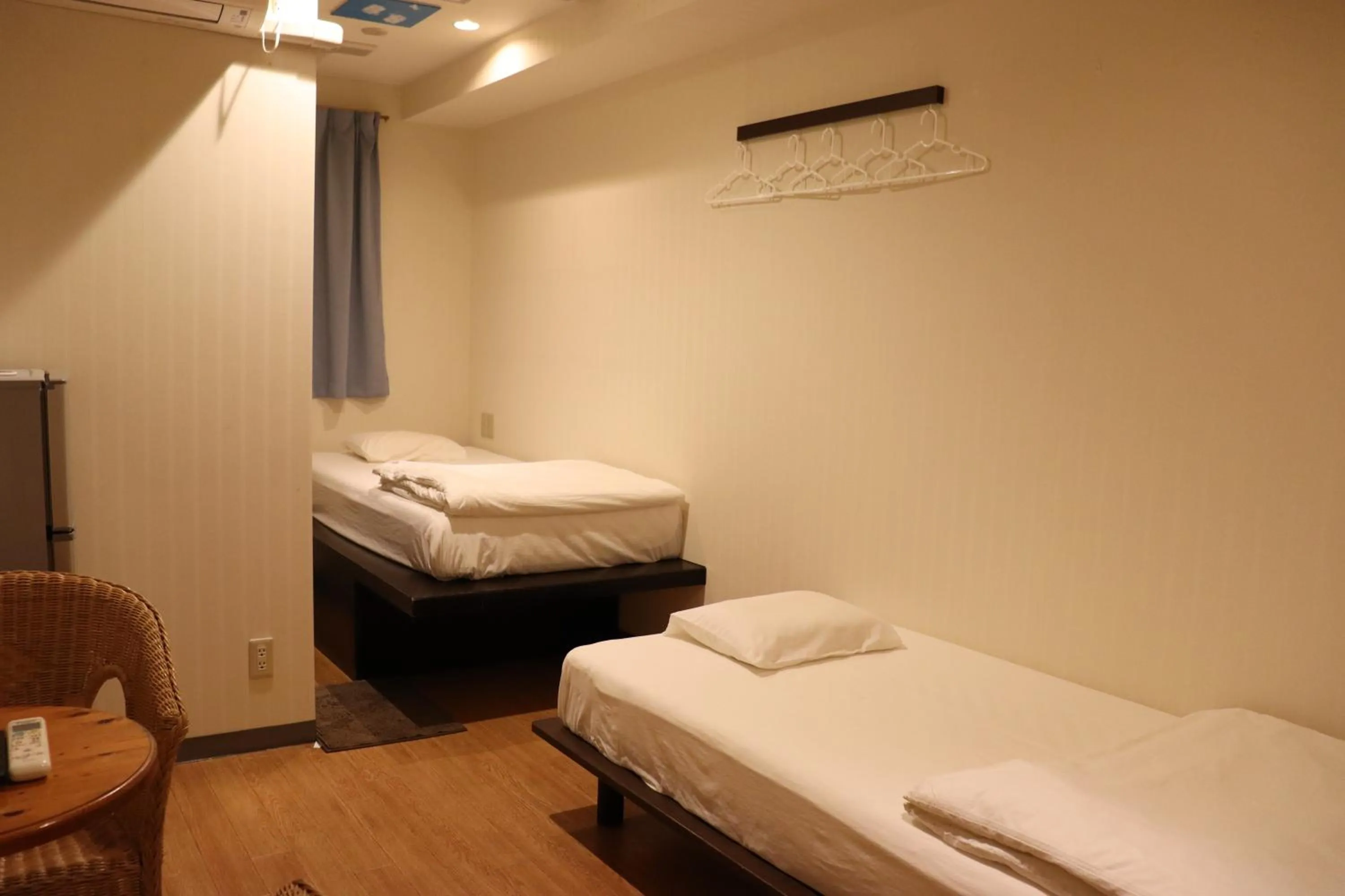 Photo of the whole room in Guest House Grand Naha