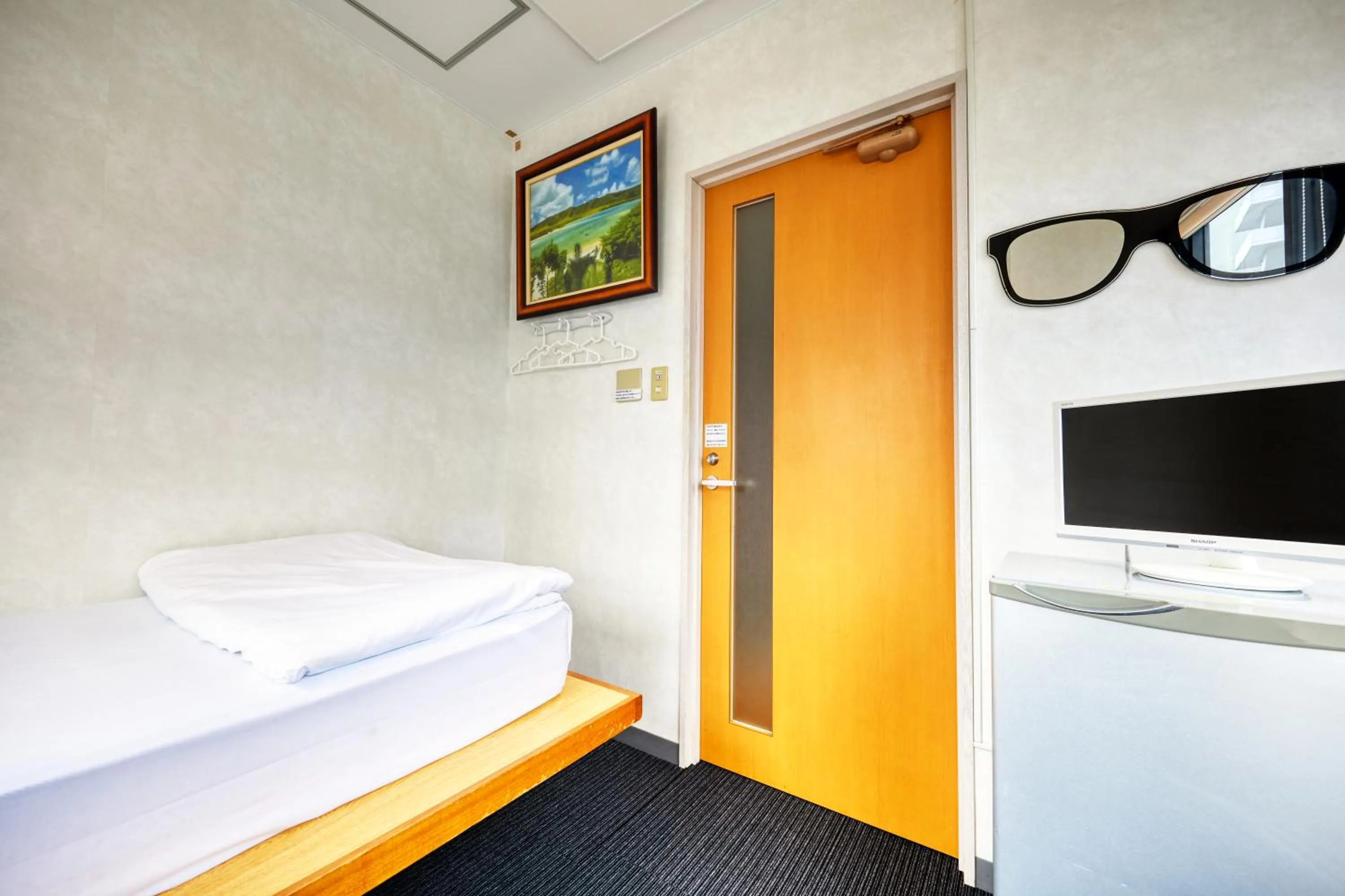 Photo of the whole room in Guest House Grand Naha