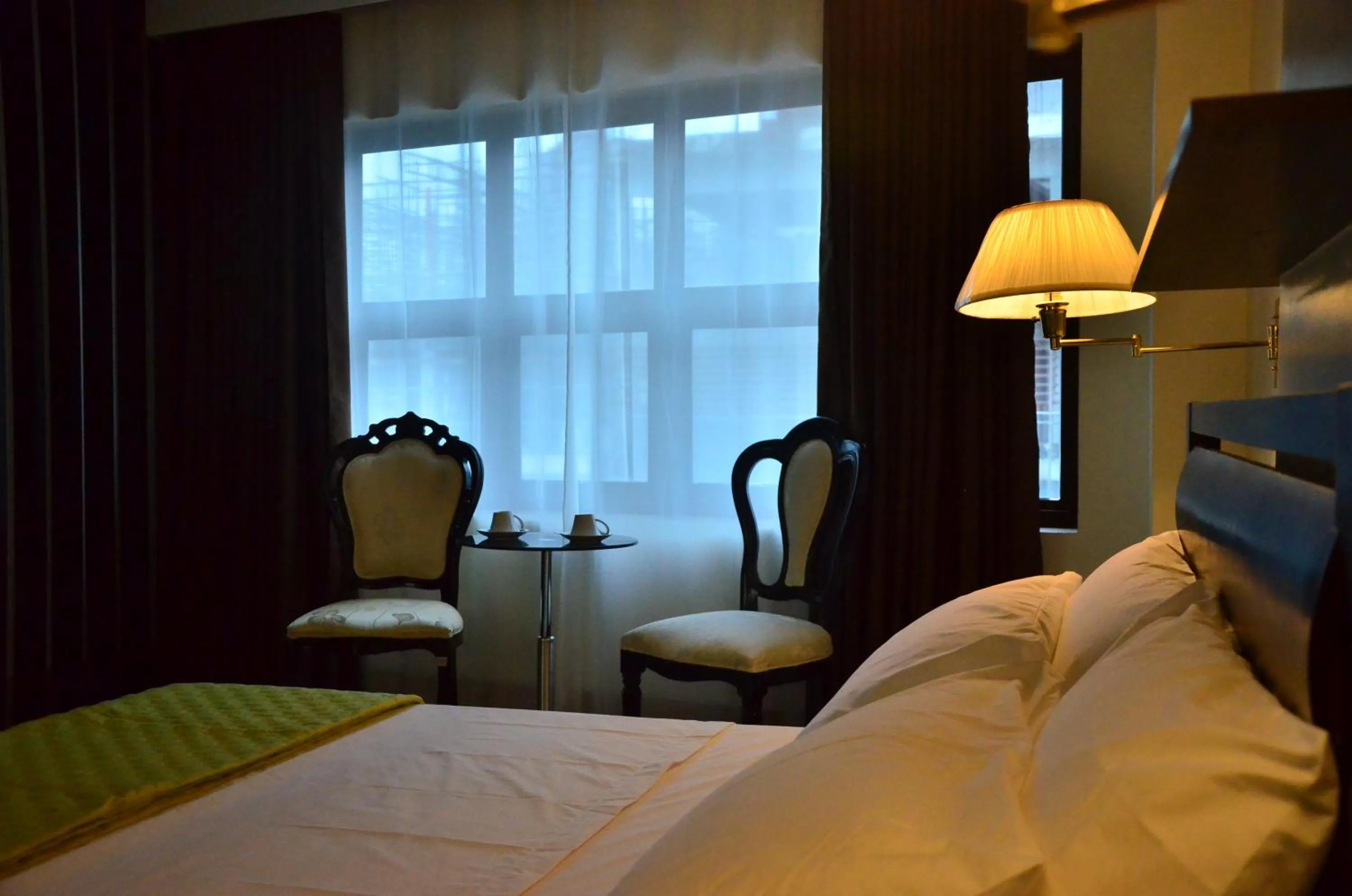 Bed in Oriental Zen Suites