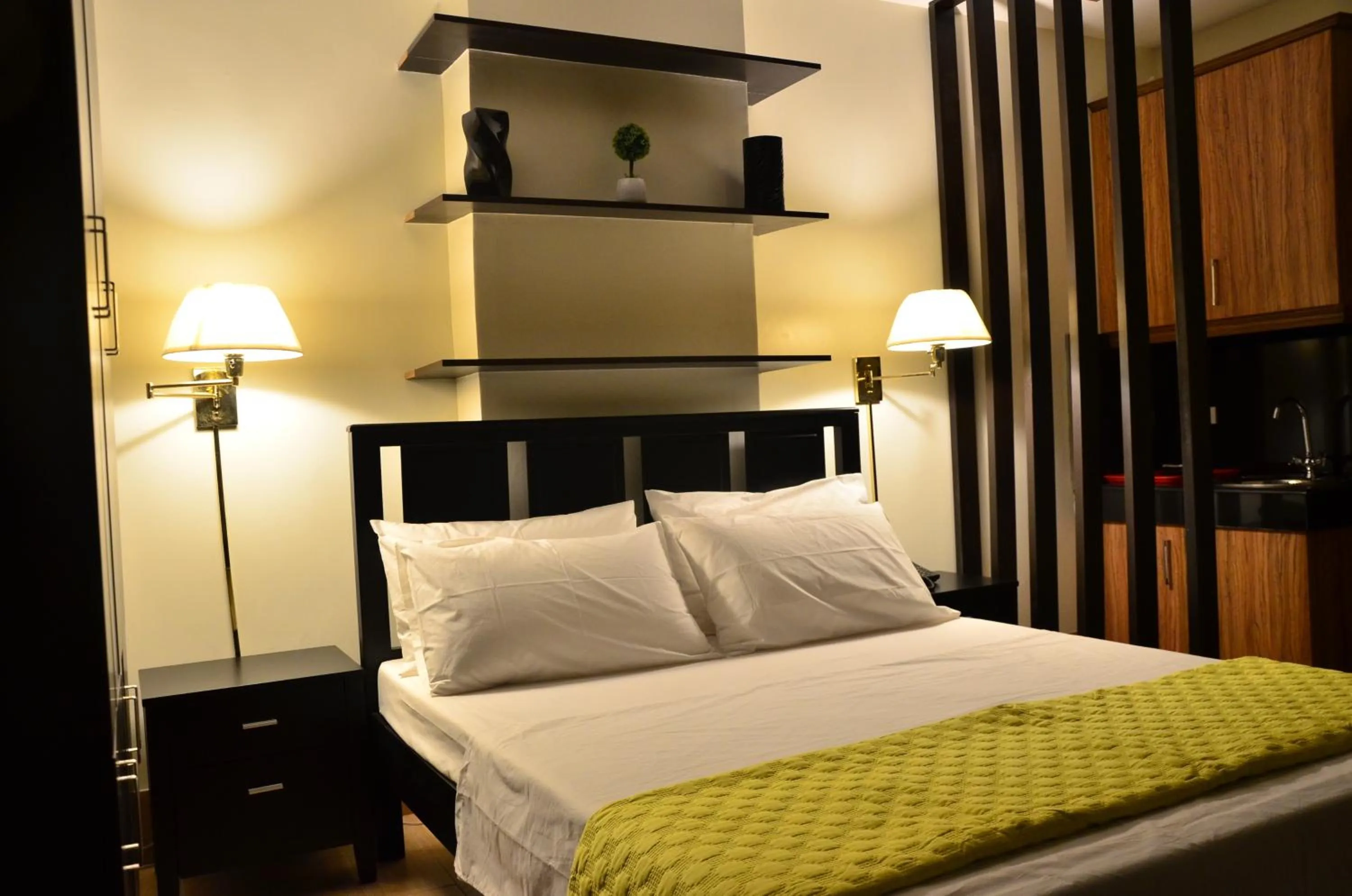 Bed in Oriental Zen Suites