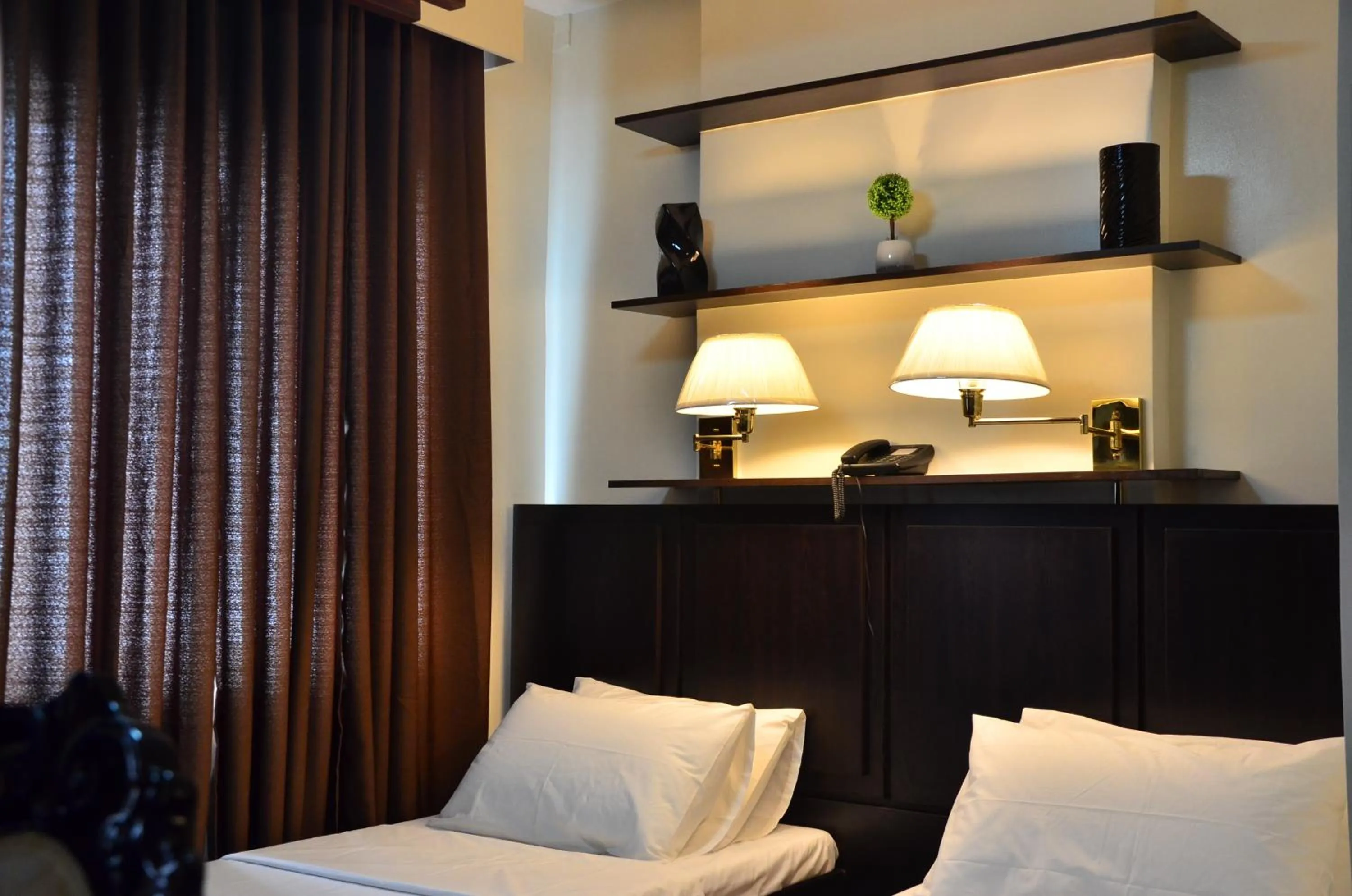 Bed in Oriental Zen Suites