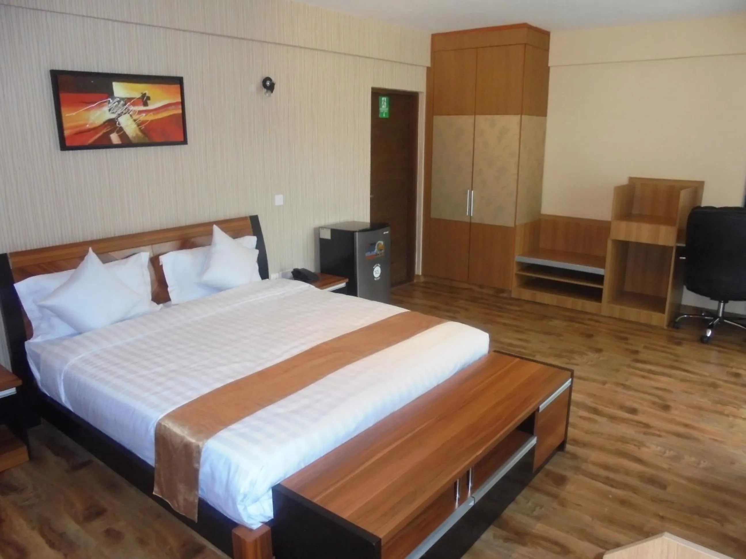 Photo of the whole room, Bed in We Hotel and Suites