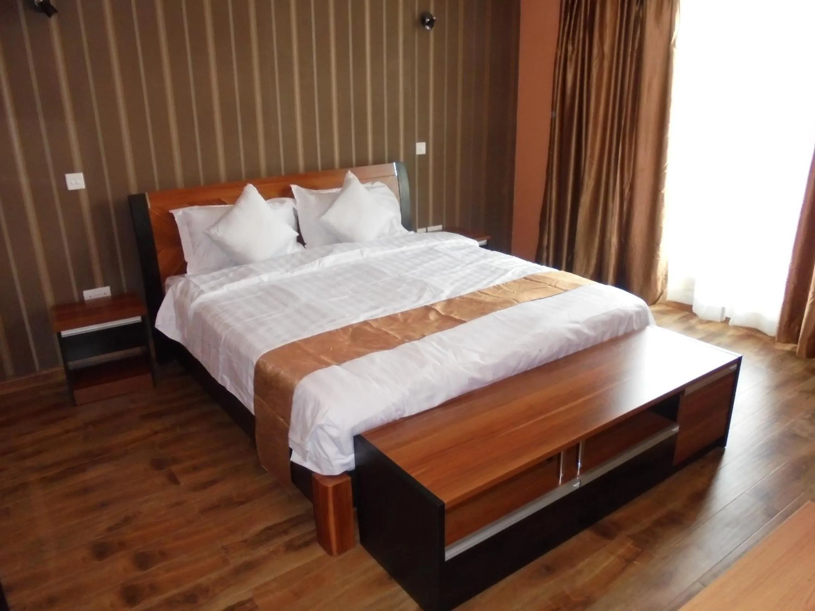 Photo of the whole room, Bed in We Hotel and Suites