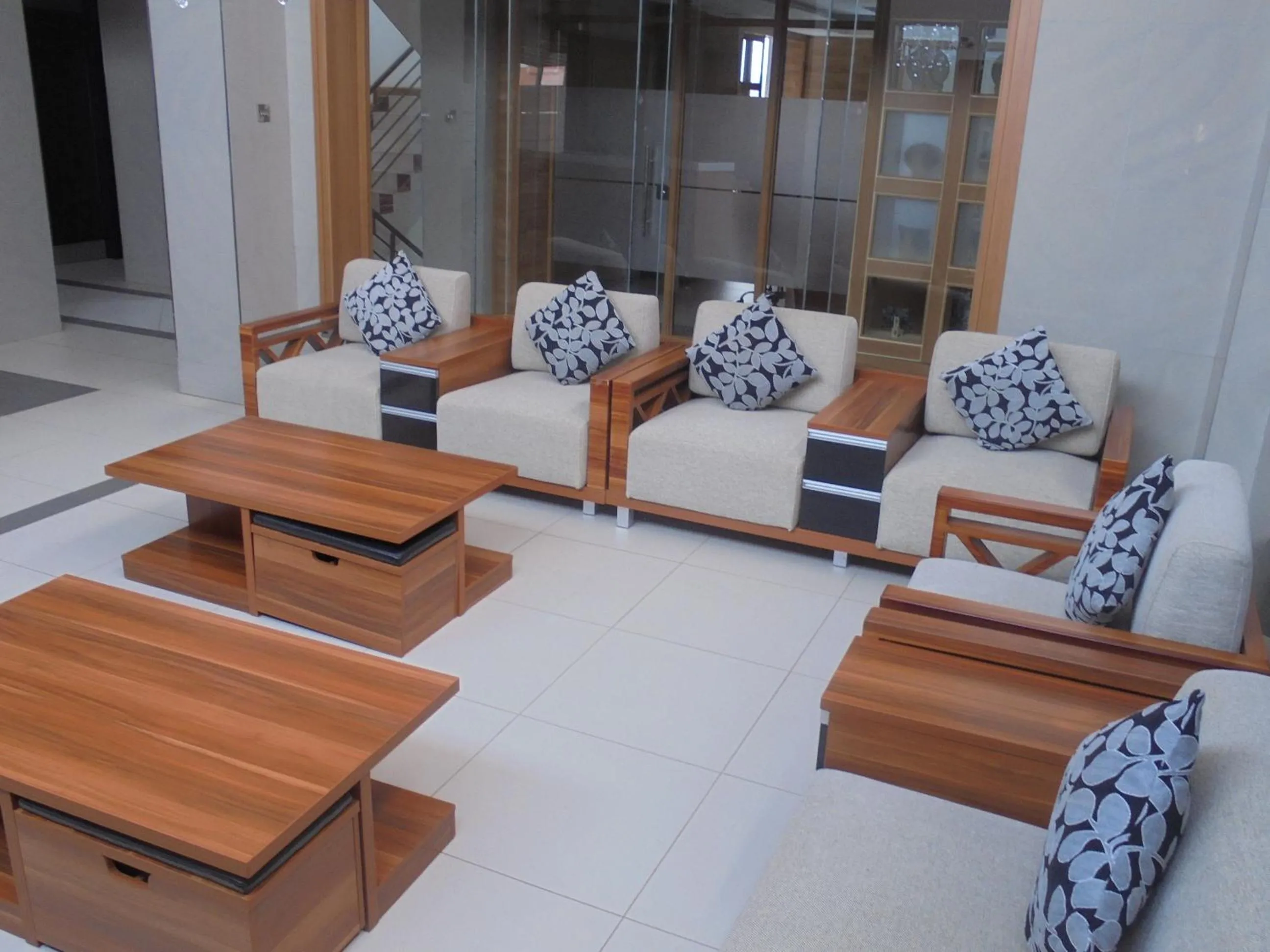 Communal lounge/ TV room in We Hotel and Suites