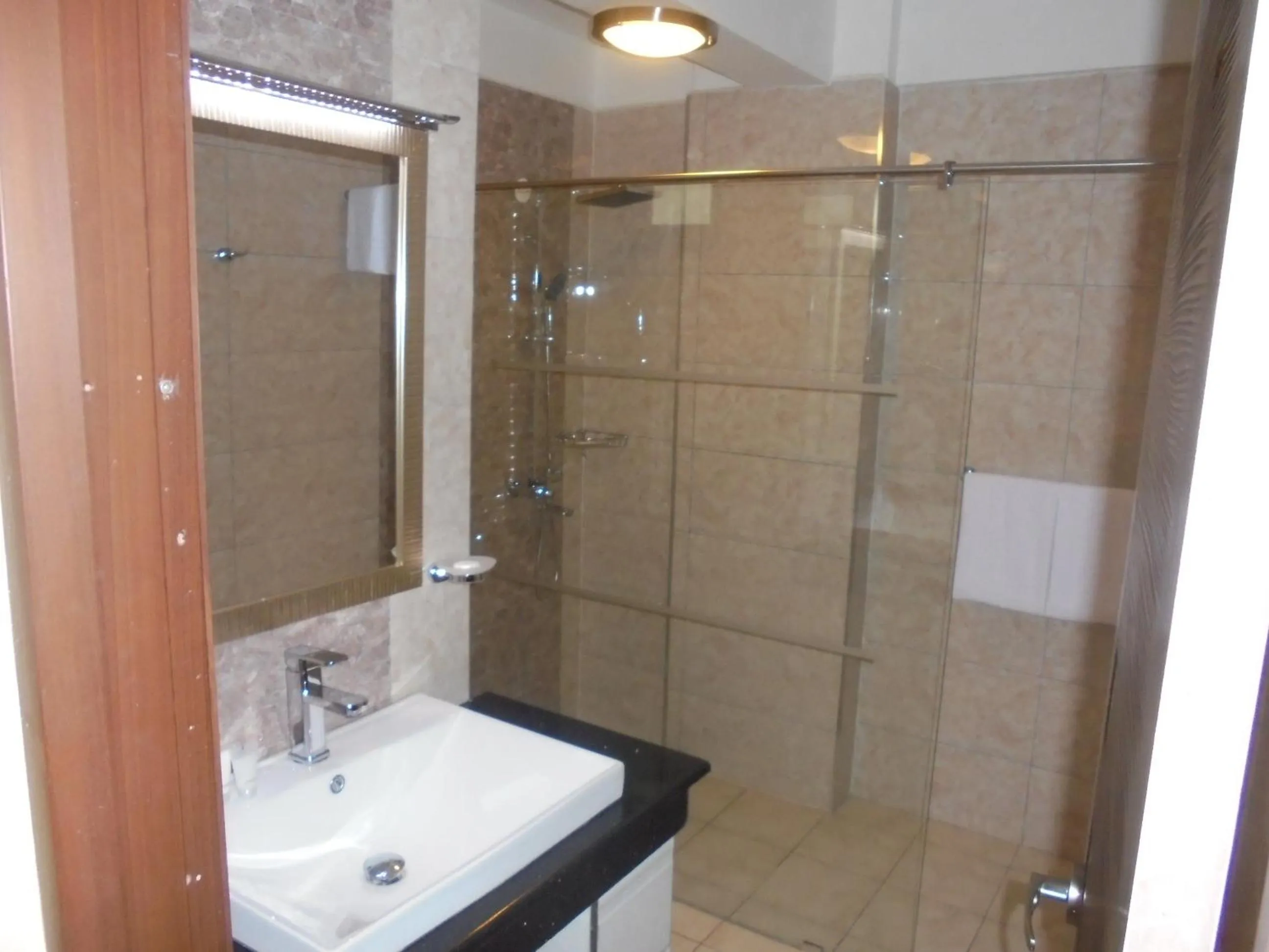 Bathroom in We Hotel and Suites