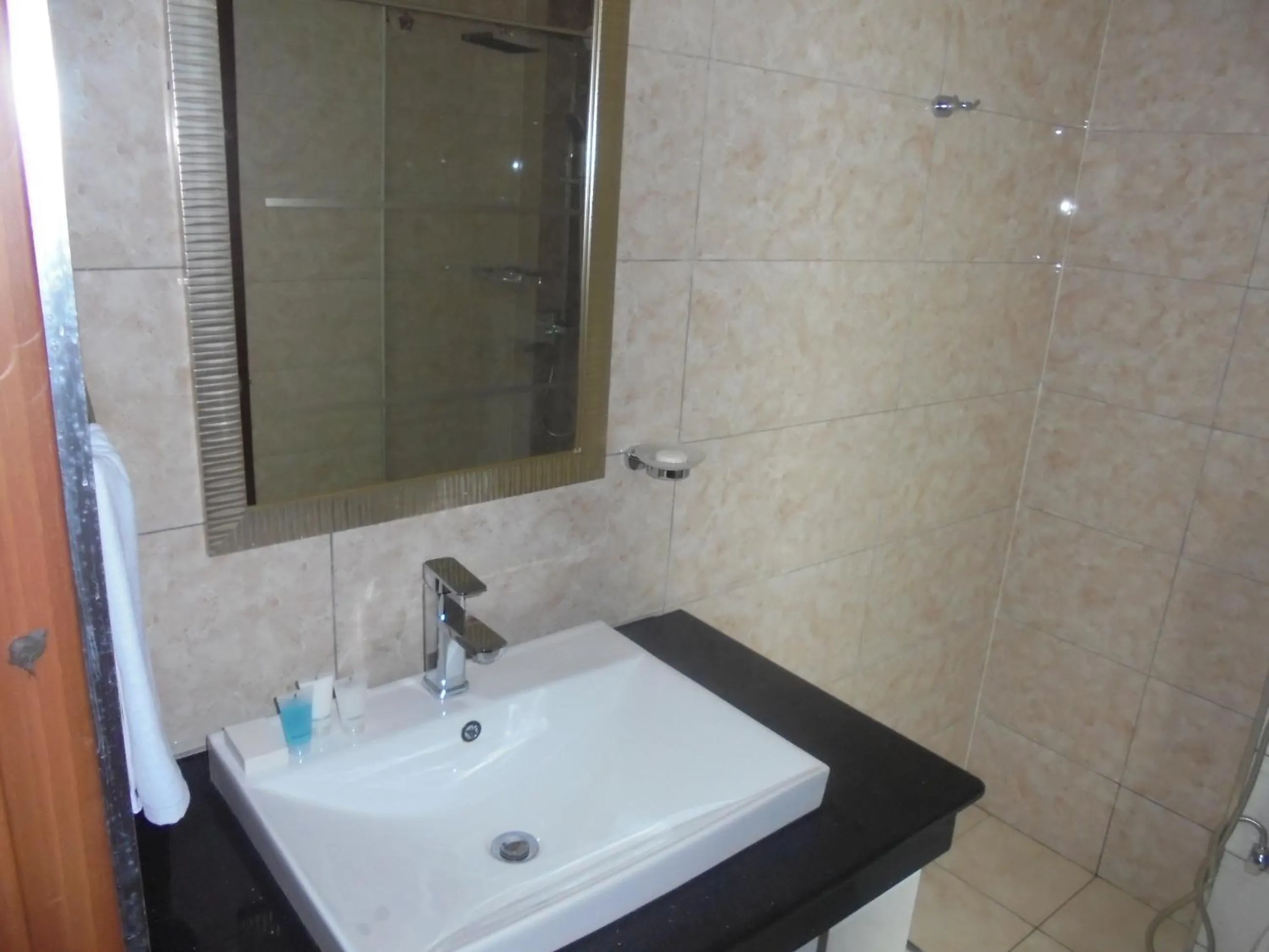 Bathroom in We Hotel and Suites