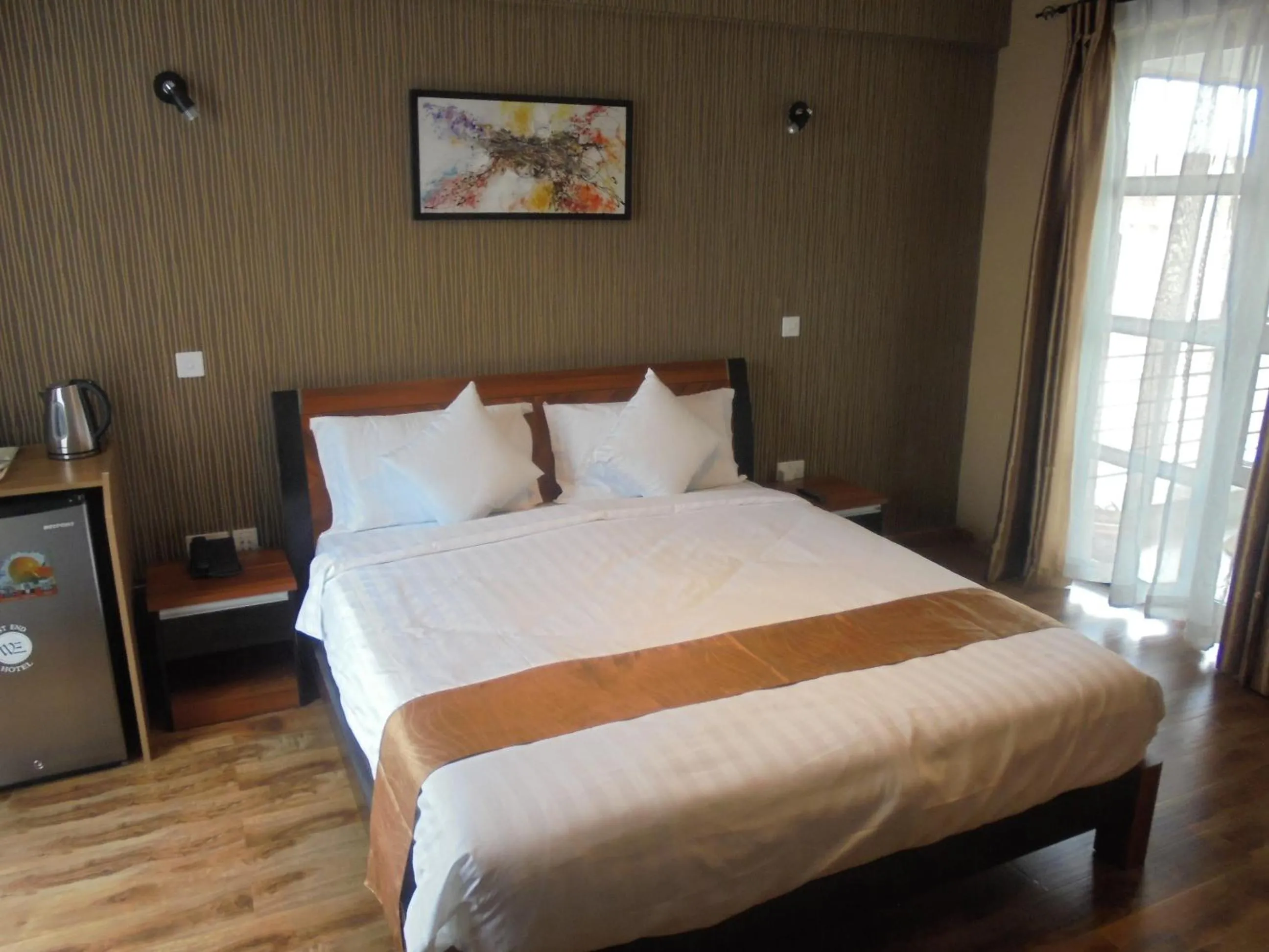 Photo of the whole room, Bed in We Hotel and Suites