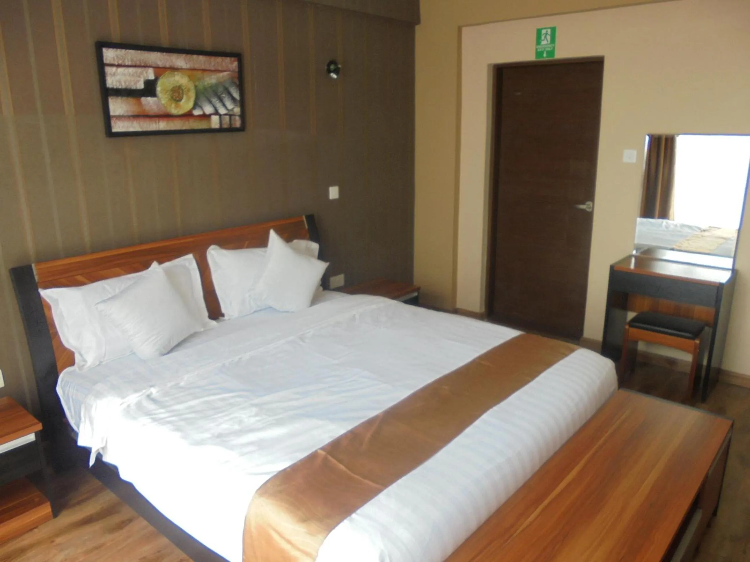 Bedroom, Bed in We Hotel and Suites